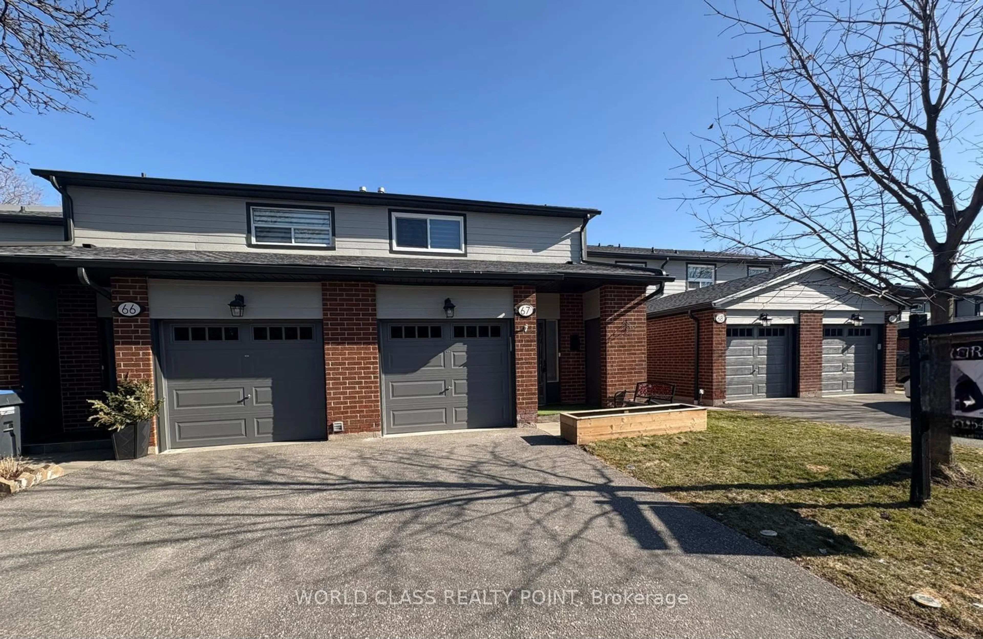 Home with brick exterior material, street for 525 Meadows Blvd #67, Mississauga Ontario L4Z 1H2