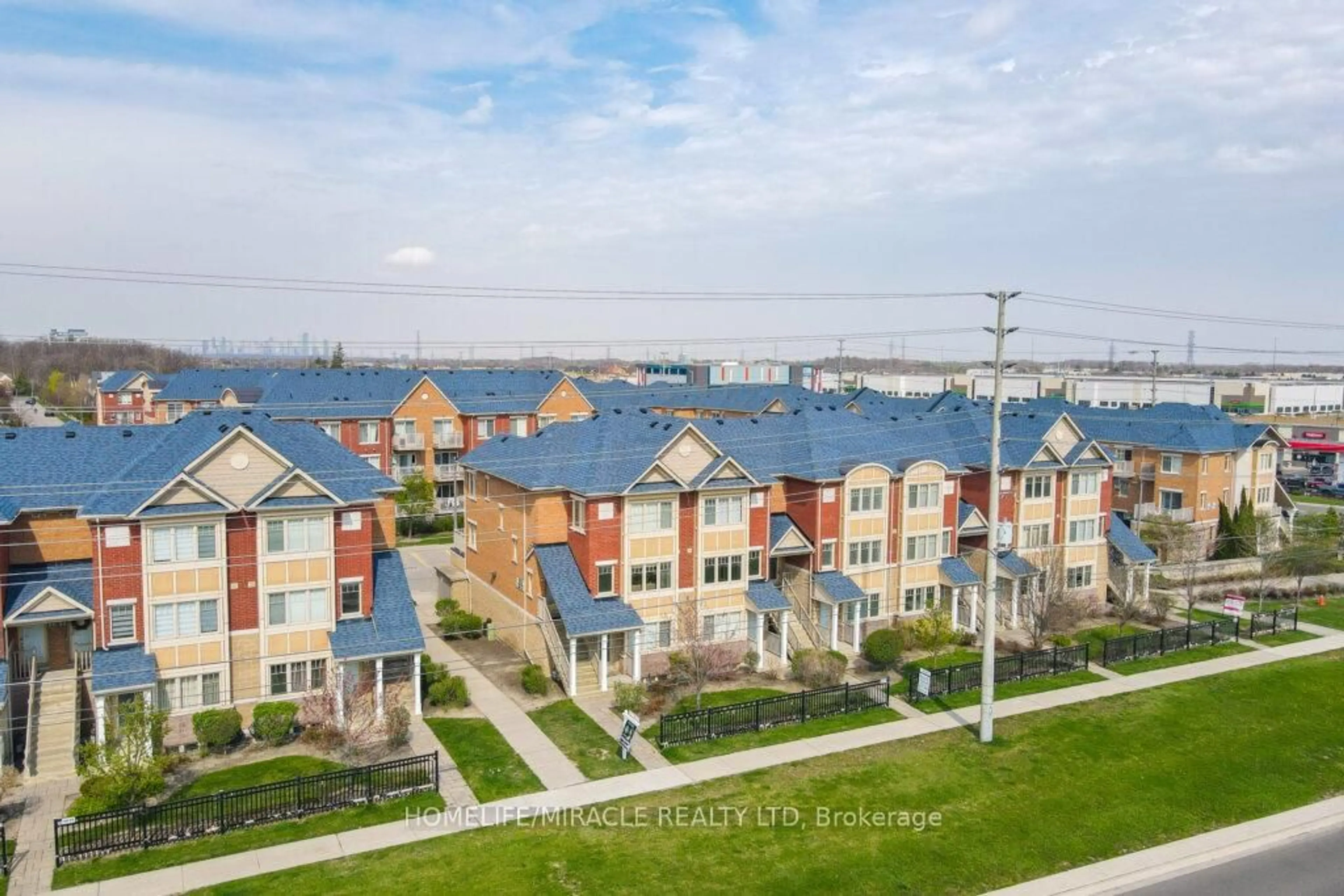 A pic from outside/outdoor area/front of a property/back of a property/a pic from drone, water/lake/river/ocean view for 5025 Ninth Line #11, Mississauga Ontario L5M 0E6