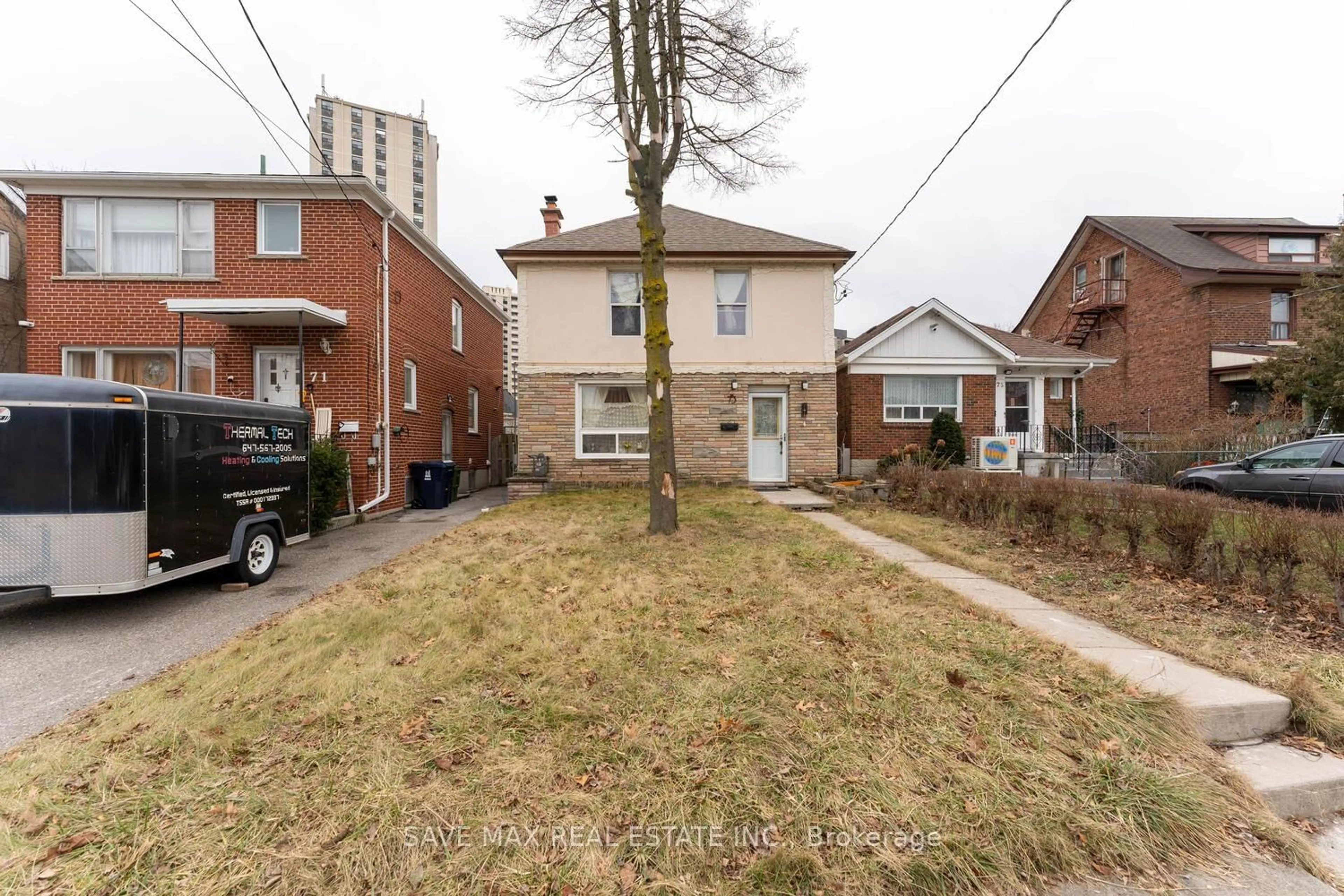 A pic from outside/outdoor area/front of a property/back of a property/a pic from drone, street for 73 Buttonwood Ave, Toronto Ontario M6M 2H9