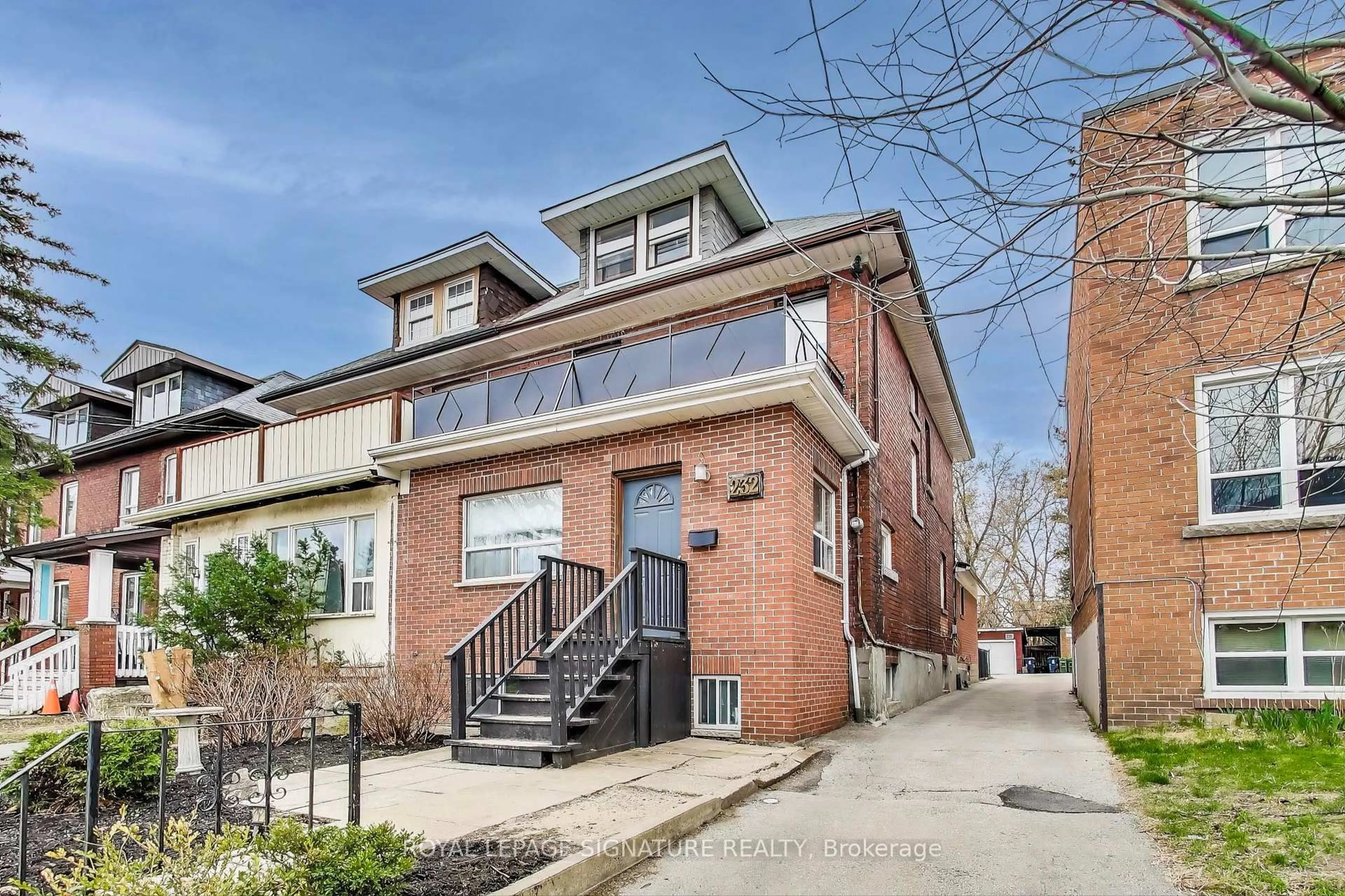 Home with brick exterior material, street for 232 Pacific Ave, Toronto Ontario M6P 2P5