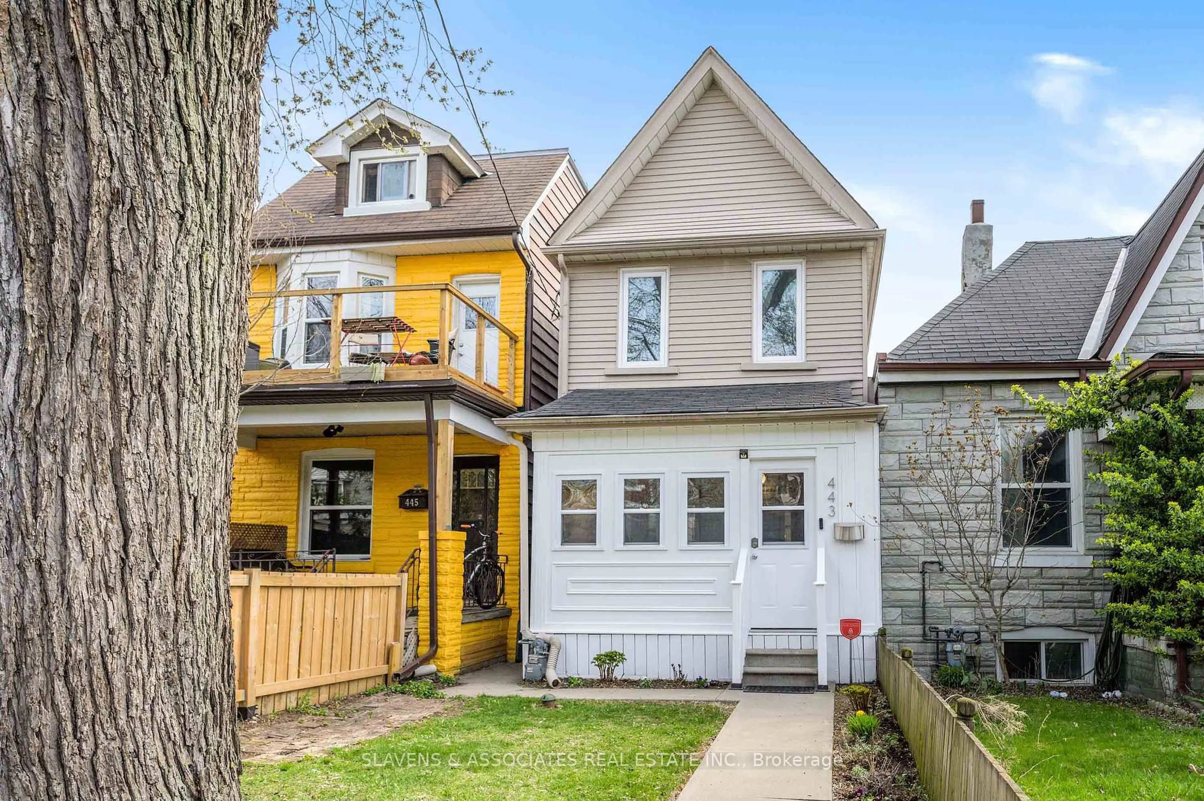Home with vinyl exterior material, street for 443 Concord Ave, Toronto Ontario M6H 2P9