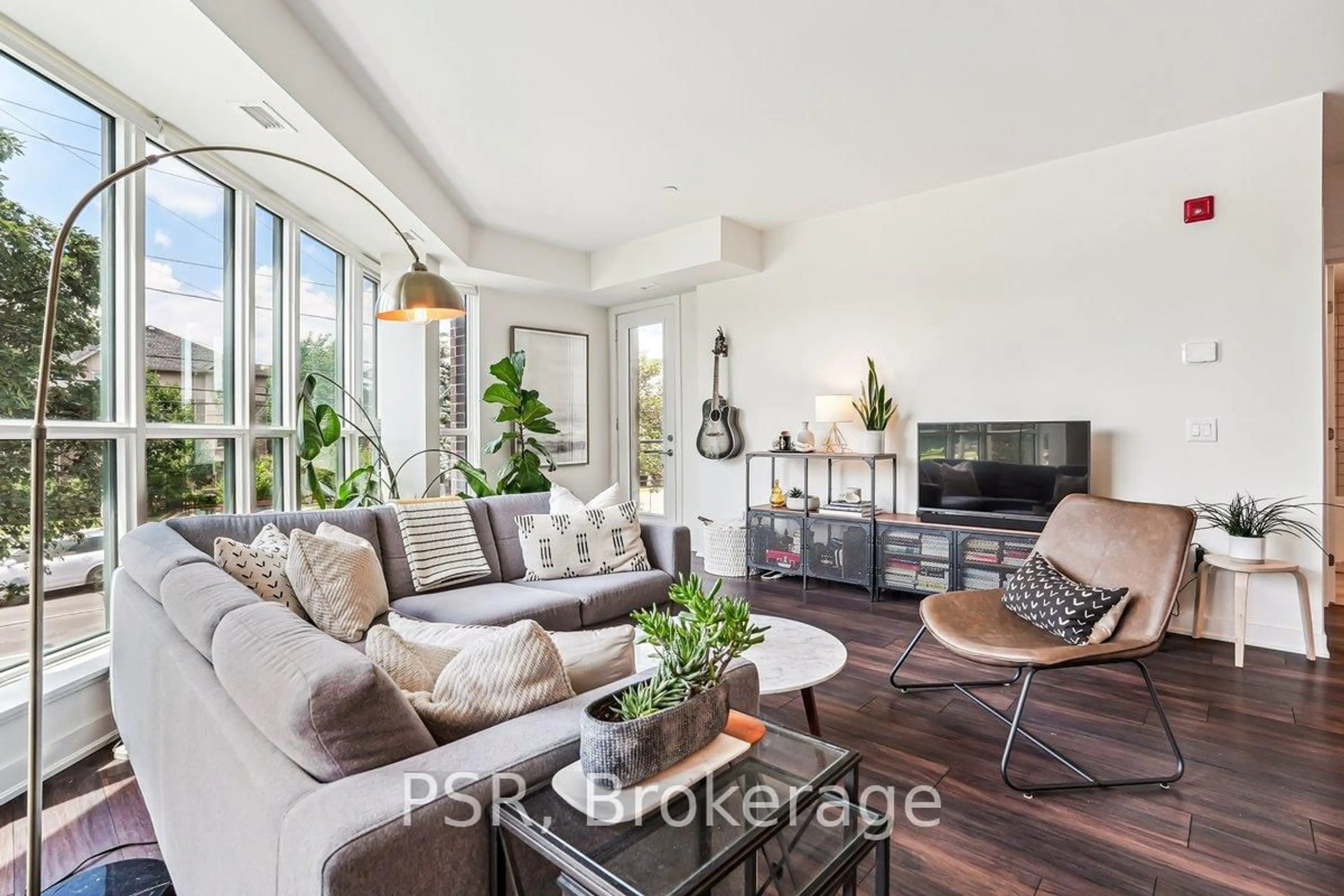 Living room with furniture, unknown for 320 Plains Rd #211, Burlington Ontario L7T 0C1
