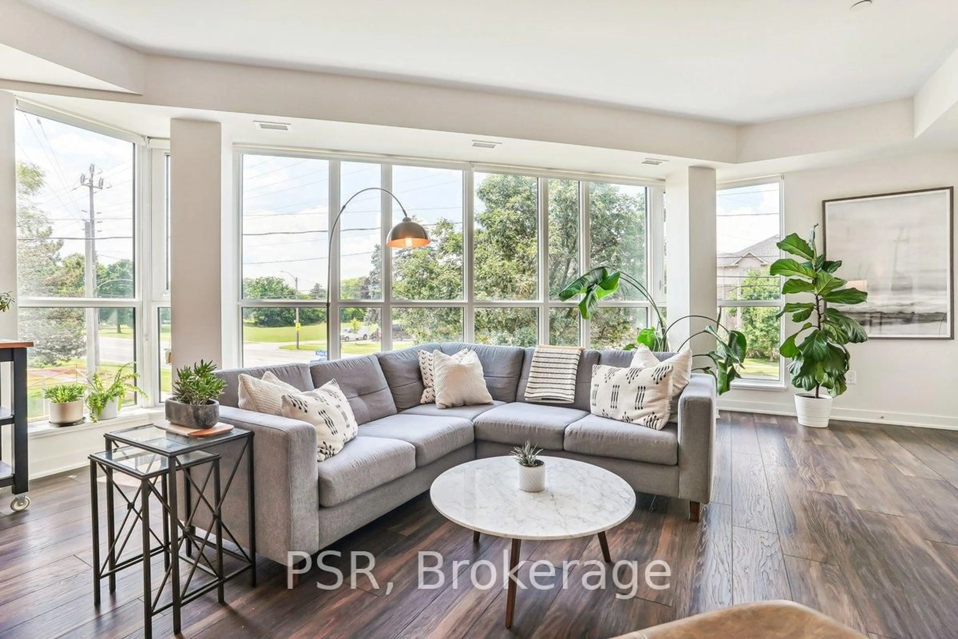 Living room with furniture, unknown for 320 Plains Rd #211, Burlington Ontario L7T 0C1