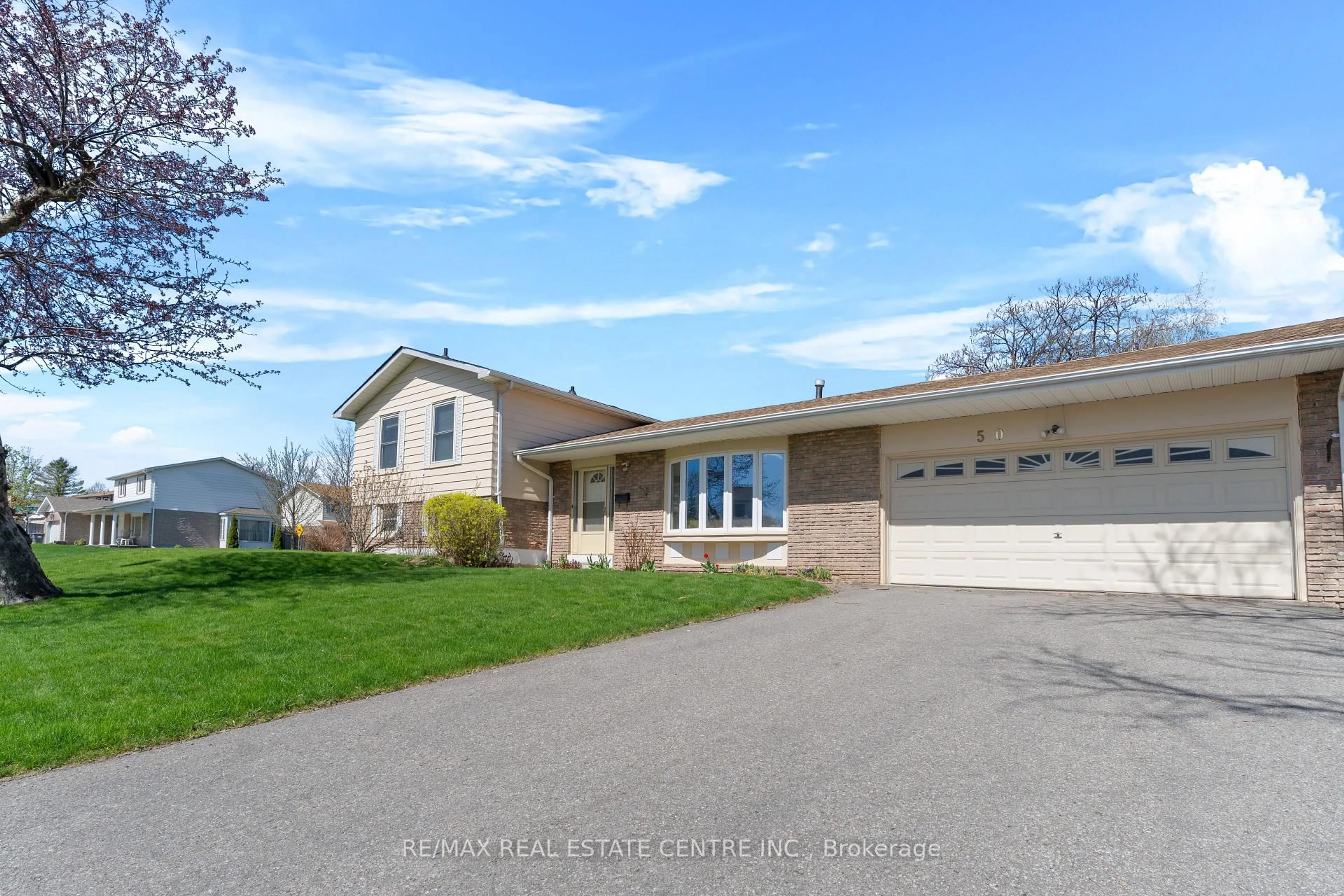 Home with vinyl exterior material, street for 50 Jerome Cres, Brampton Ontario L6S 2H1