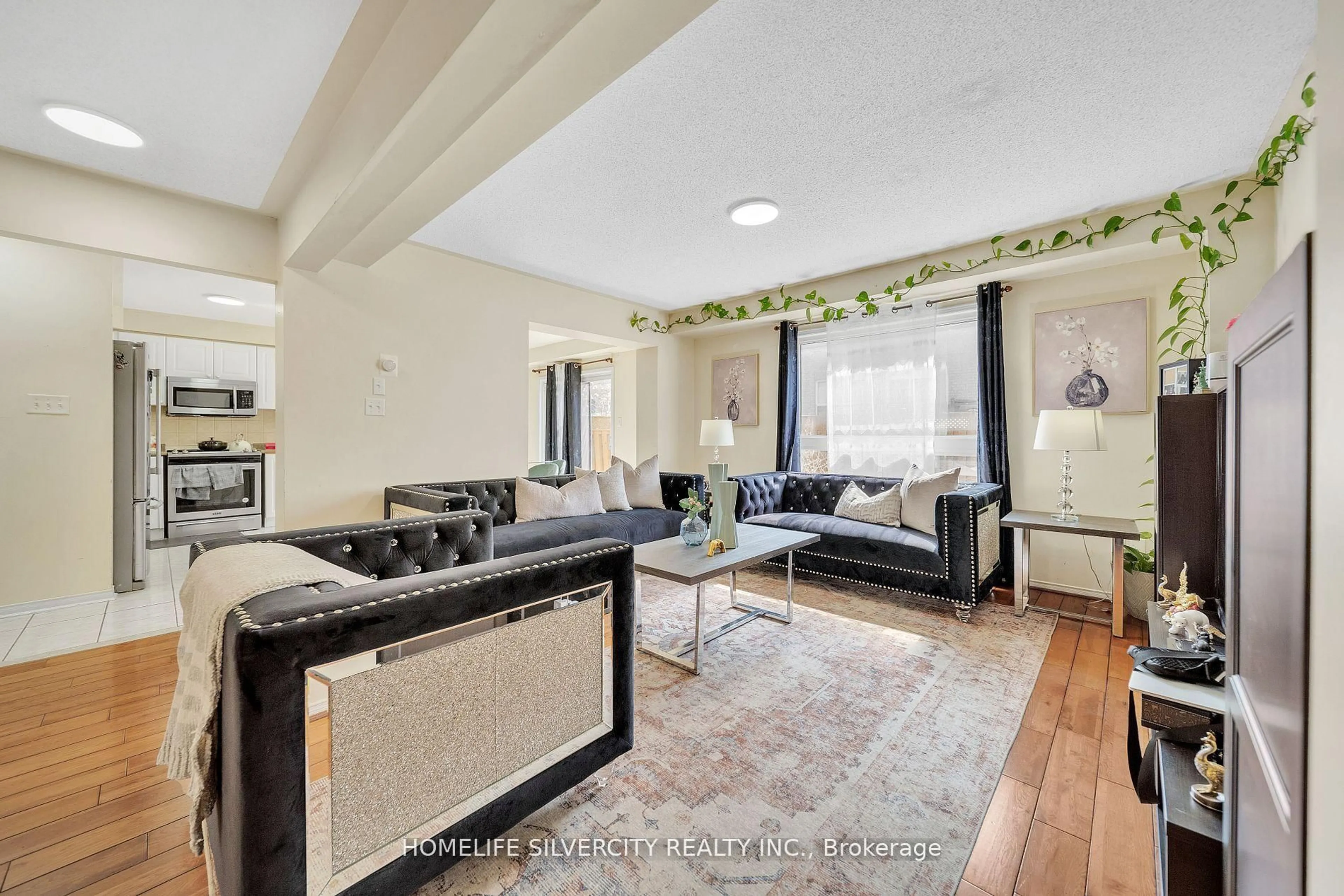 Living room with furniture, unknown for 12 Hackmore Gate, Brampton Ontario L7A 1R6