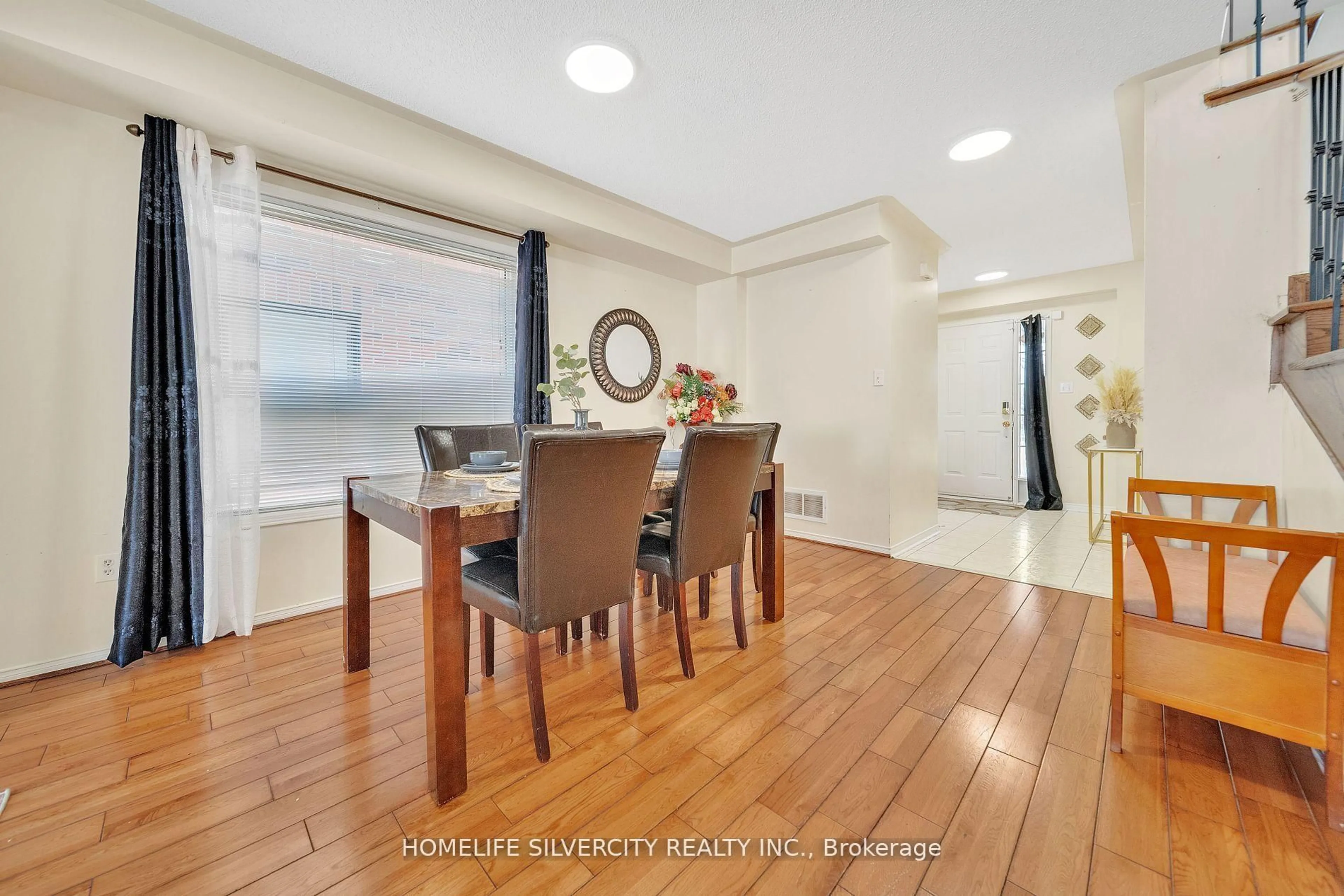 Dining room, wood/laminate floor for 12 Hackmore Gate, Brampton Ontario L7A 1R6