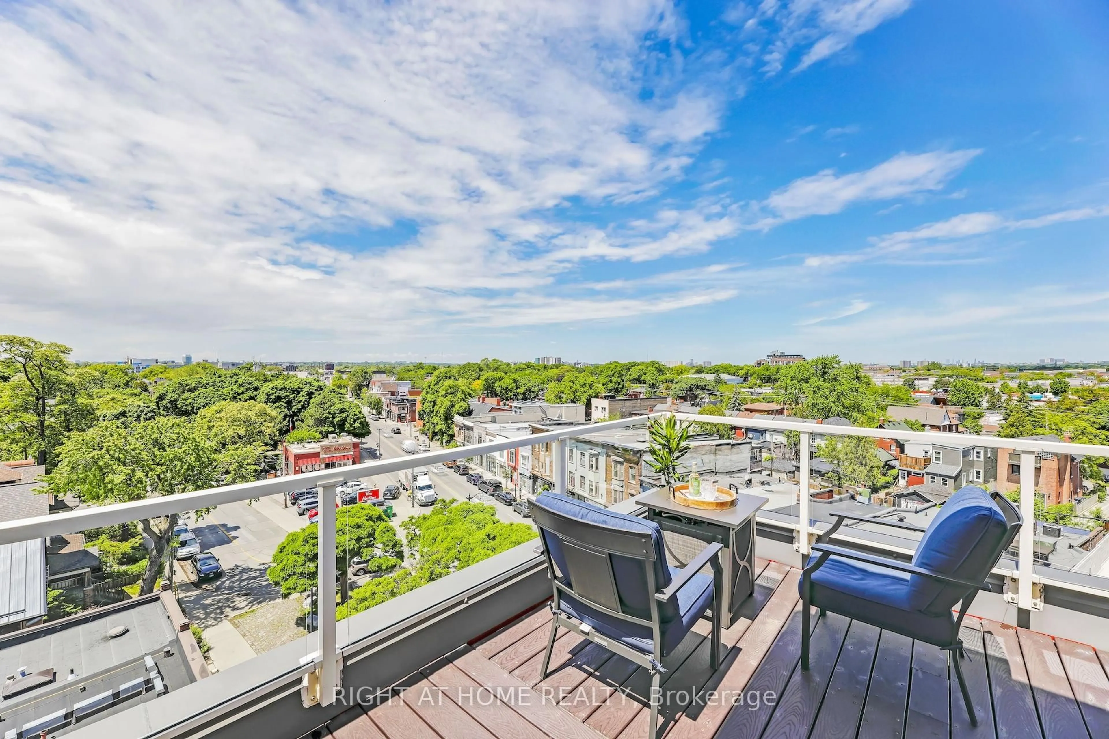 Patio, city buildings view from balcony for 1 St Johns Rd #504, Toronto Ontario M6P 1T7