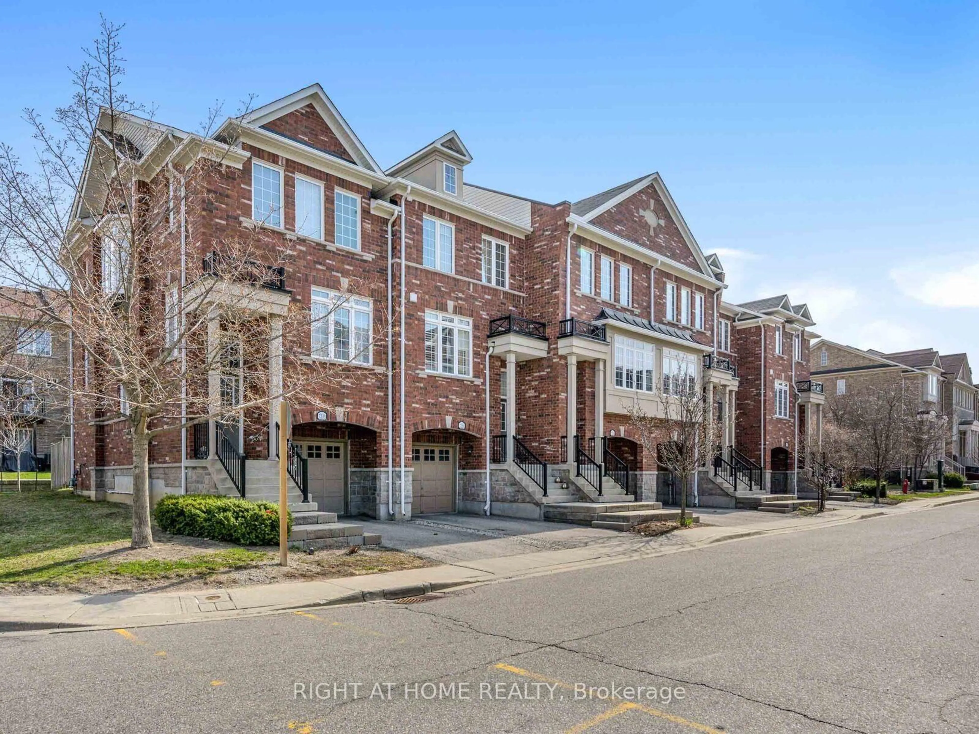 Home with brick exterior material, street for 7229 Triumph Lane #3, Mississauga Ontario L5N 0C5