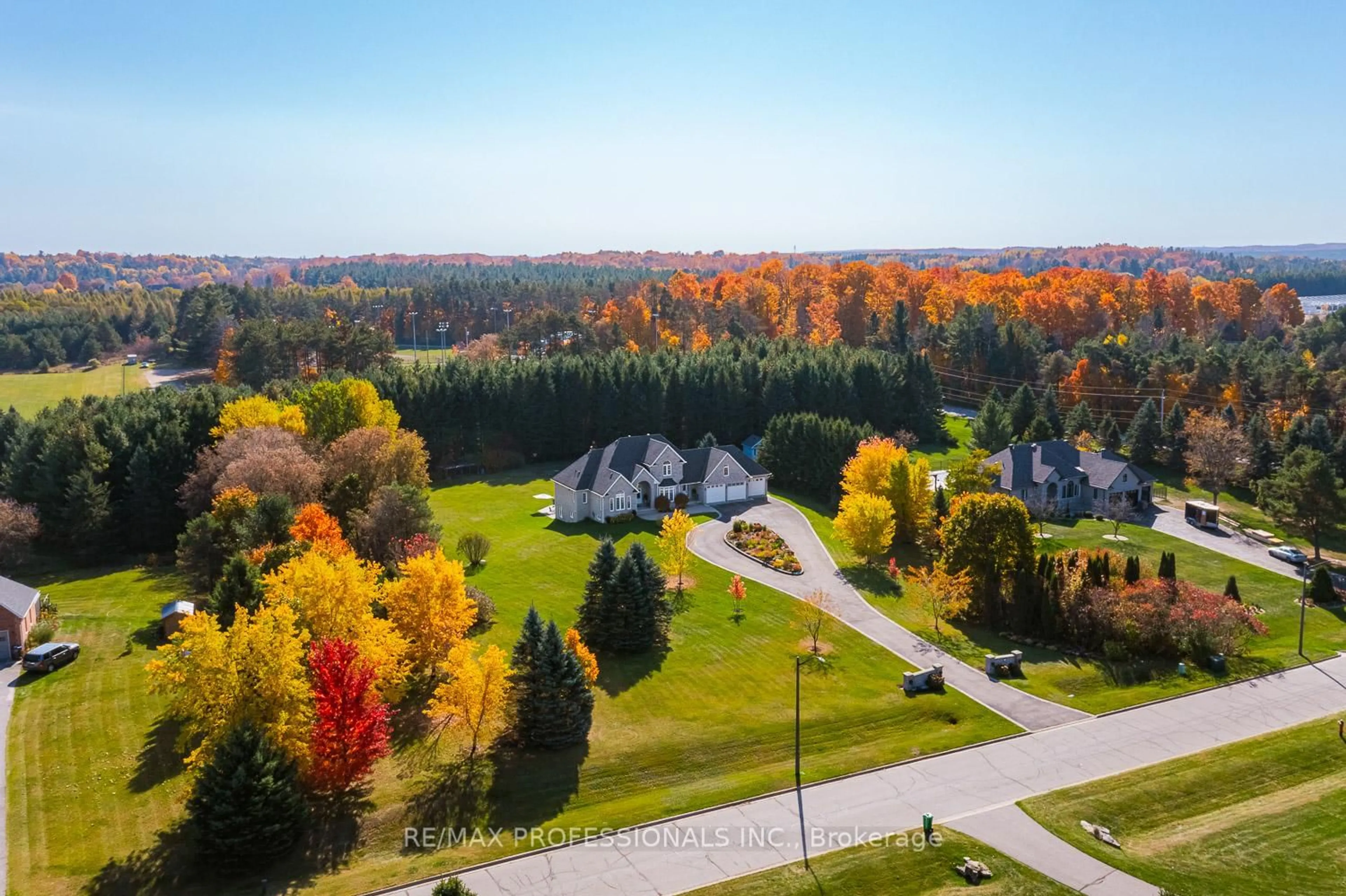 A pic from outside/outdoor area/front of a property/back of a property/a pic from drone, forest/trees view for 63 Rowley Dr, Caledon Ontario L7E 0C6
