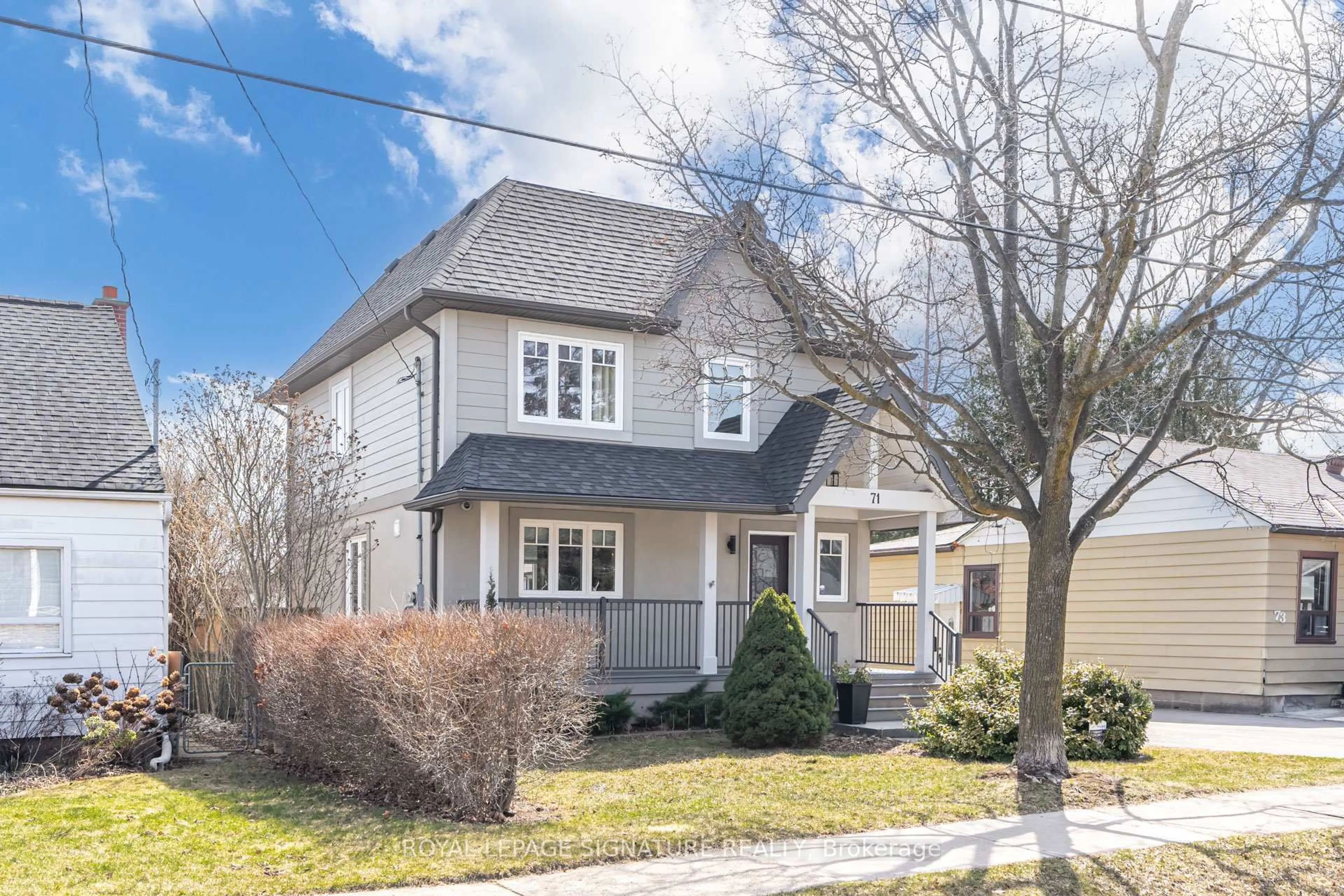 Home with brick exterior material, street for 71 Roseland Dr, Toronto Ontario M8W 1Y4