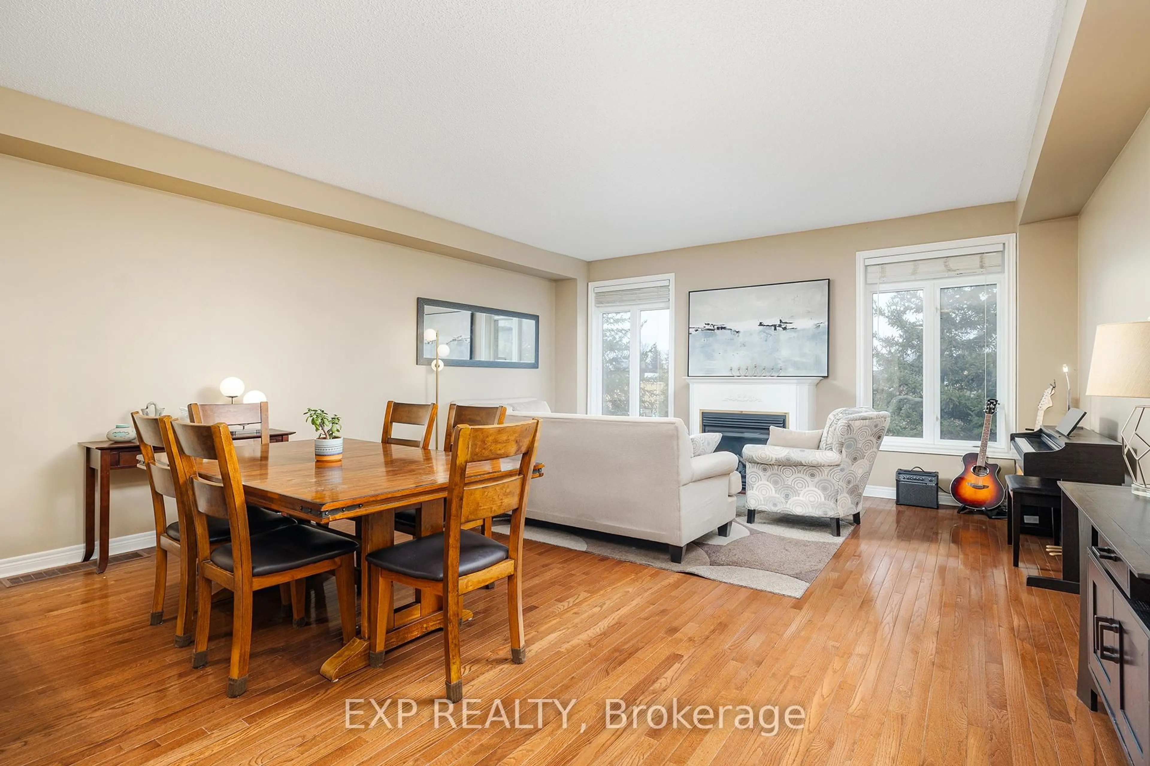 Living room with furniture, wood/laminate floor for 1169 Dorval Dr #70, Oakville Ontario L6M 4V8