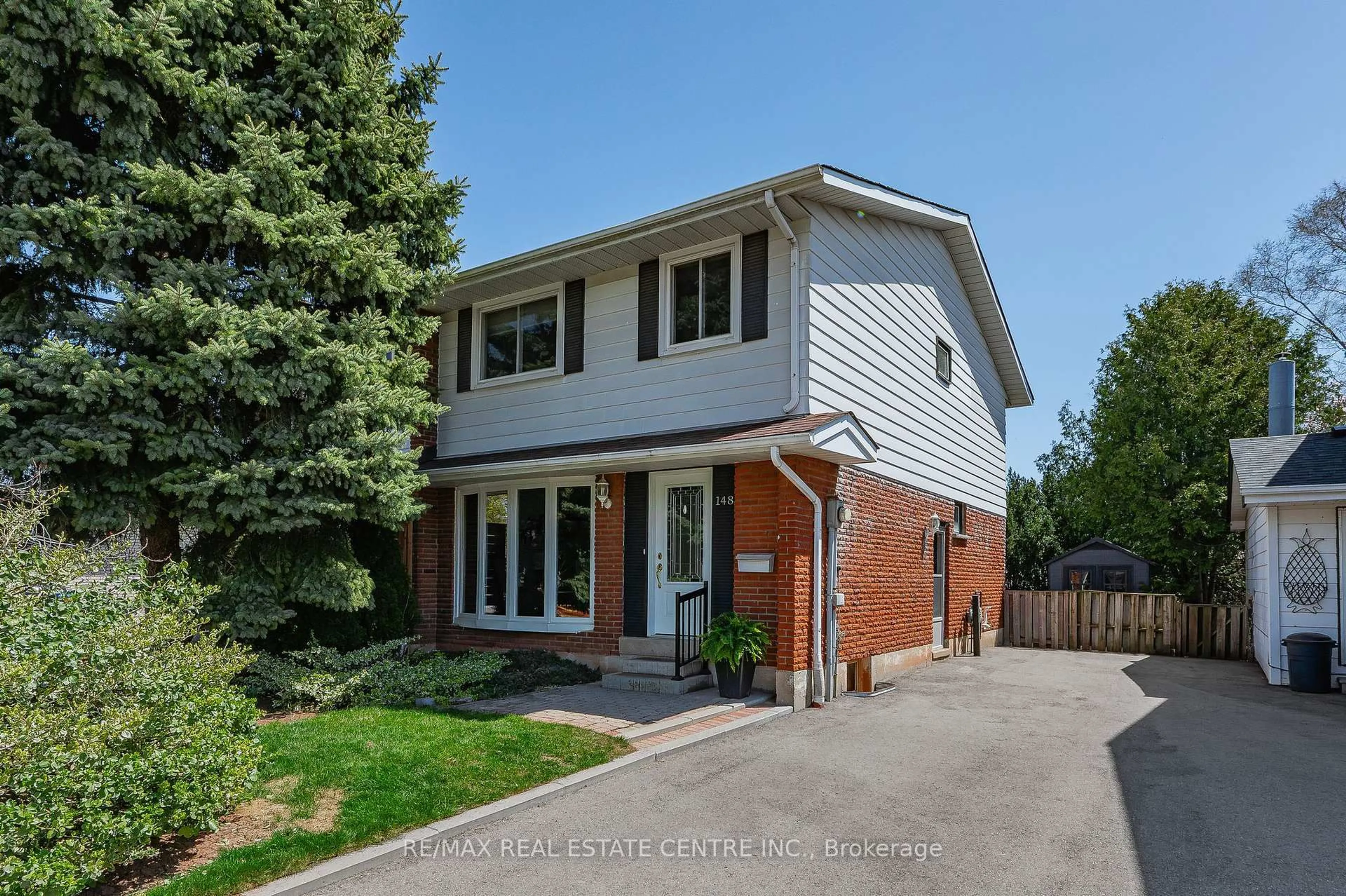 Home with brick exterior material, street for 148 Mccraney St, Oakville Ontario L6H 1H6