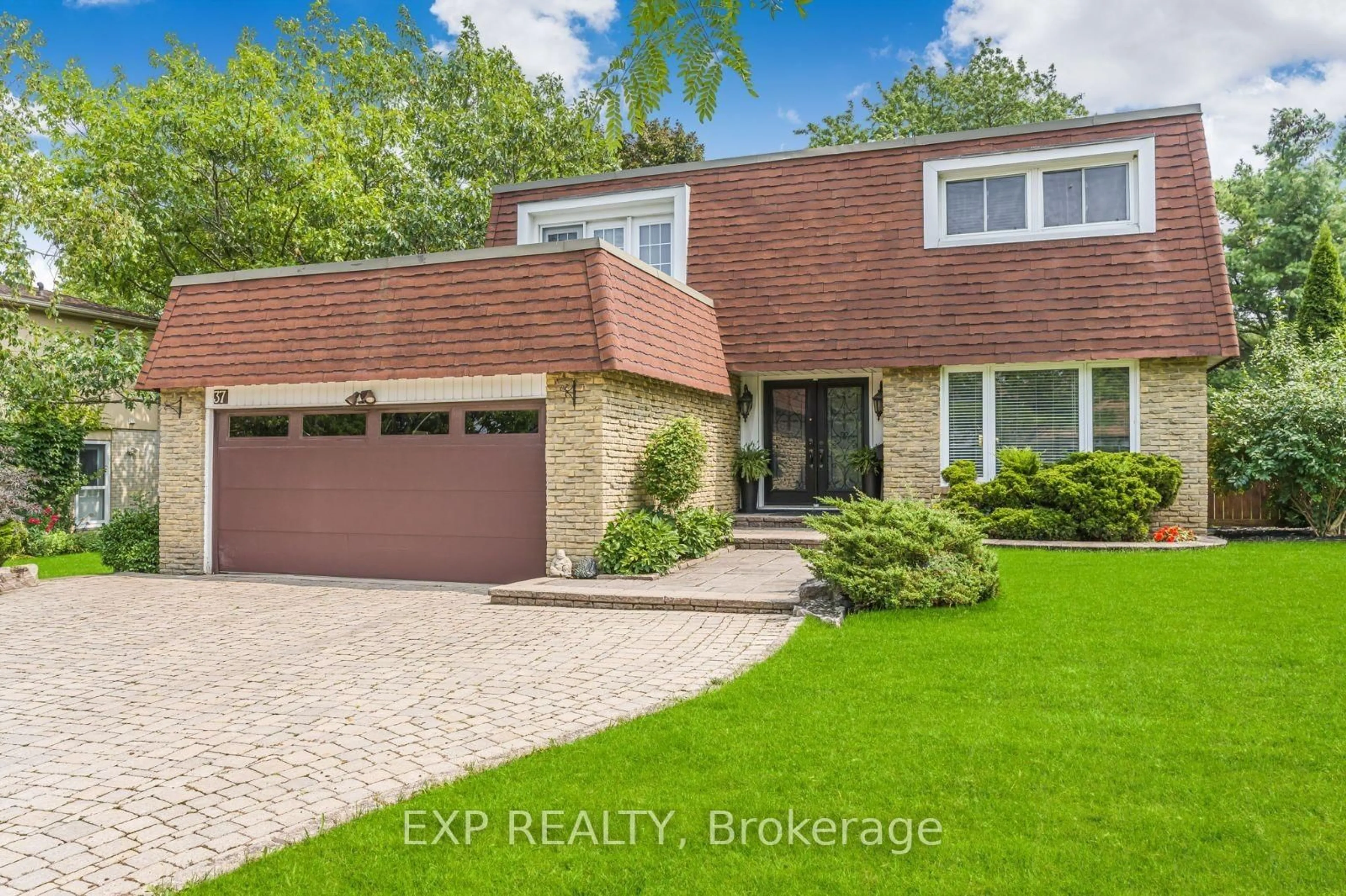 Home with brick exterior material, street for 37 Kenninghall Blvd, Mississauga Ontario L5N 1J5