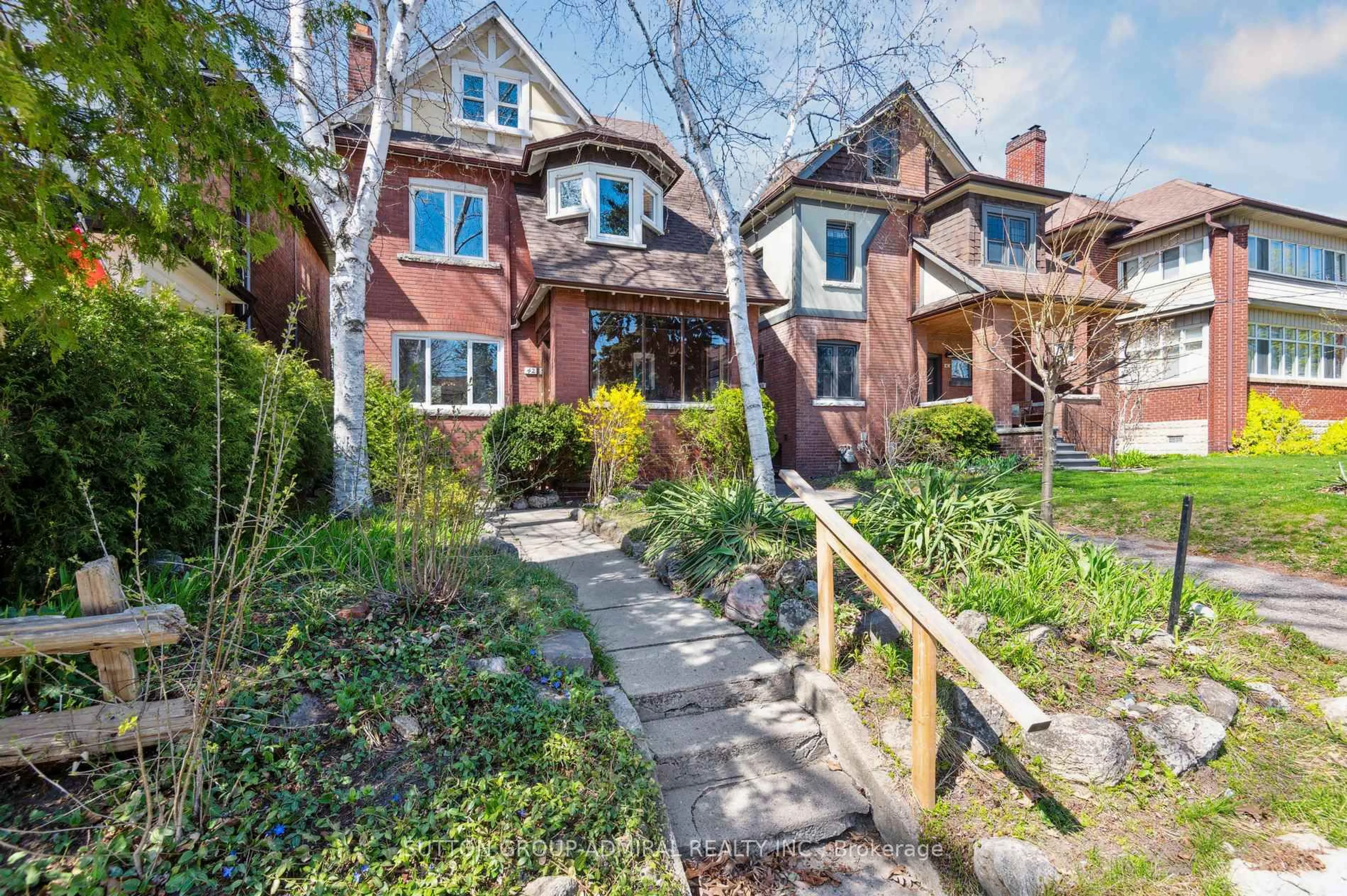 Home with brick exterior material, street for 42 Woodside Ave, Toronto Ontario M6P 1L8