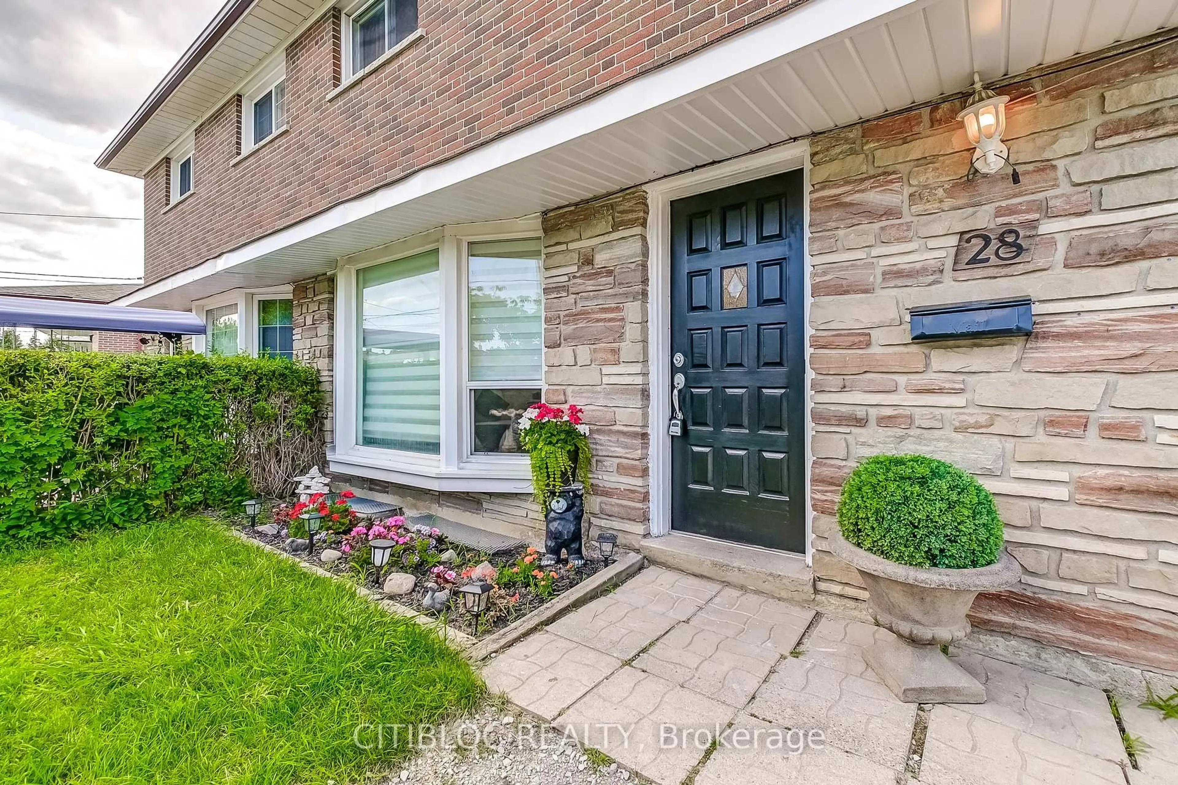 Home with brick exterior material, street for 28 Navenby Cres, Toronto Ontario M9L 1B2