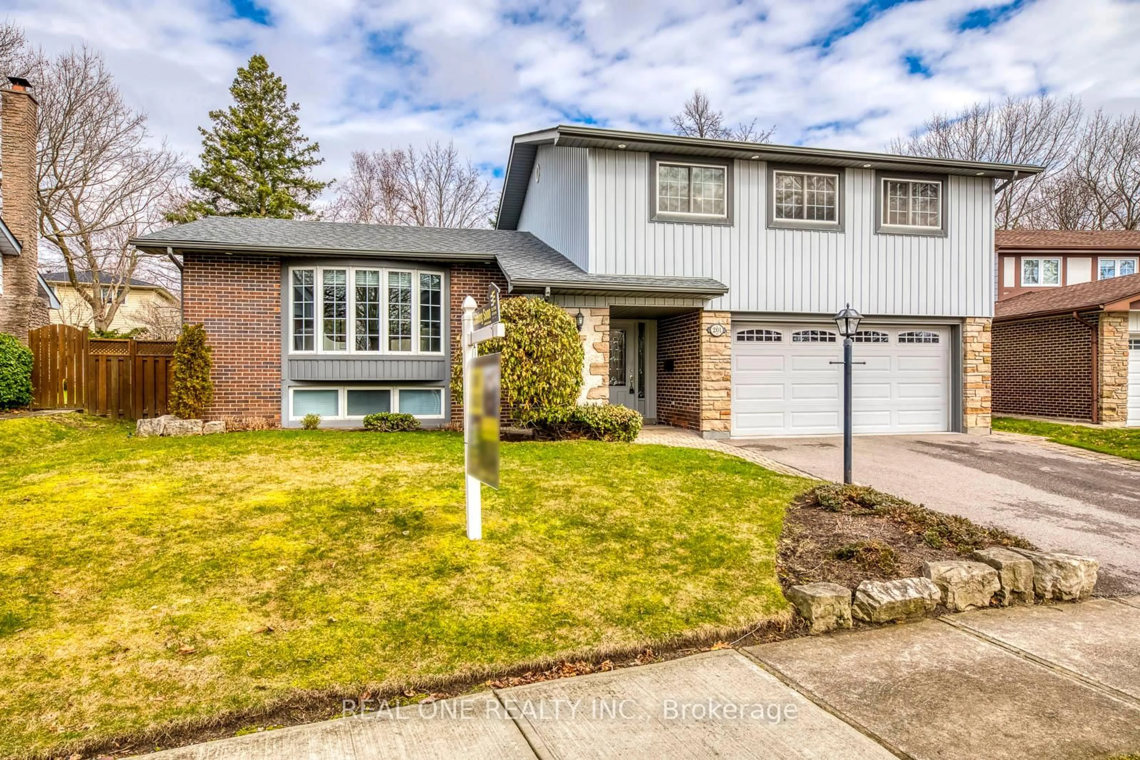 Home with brick exterior material, street for 201 Arichat Rd, Oakville Ontario L6J 5N5
