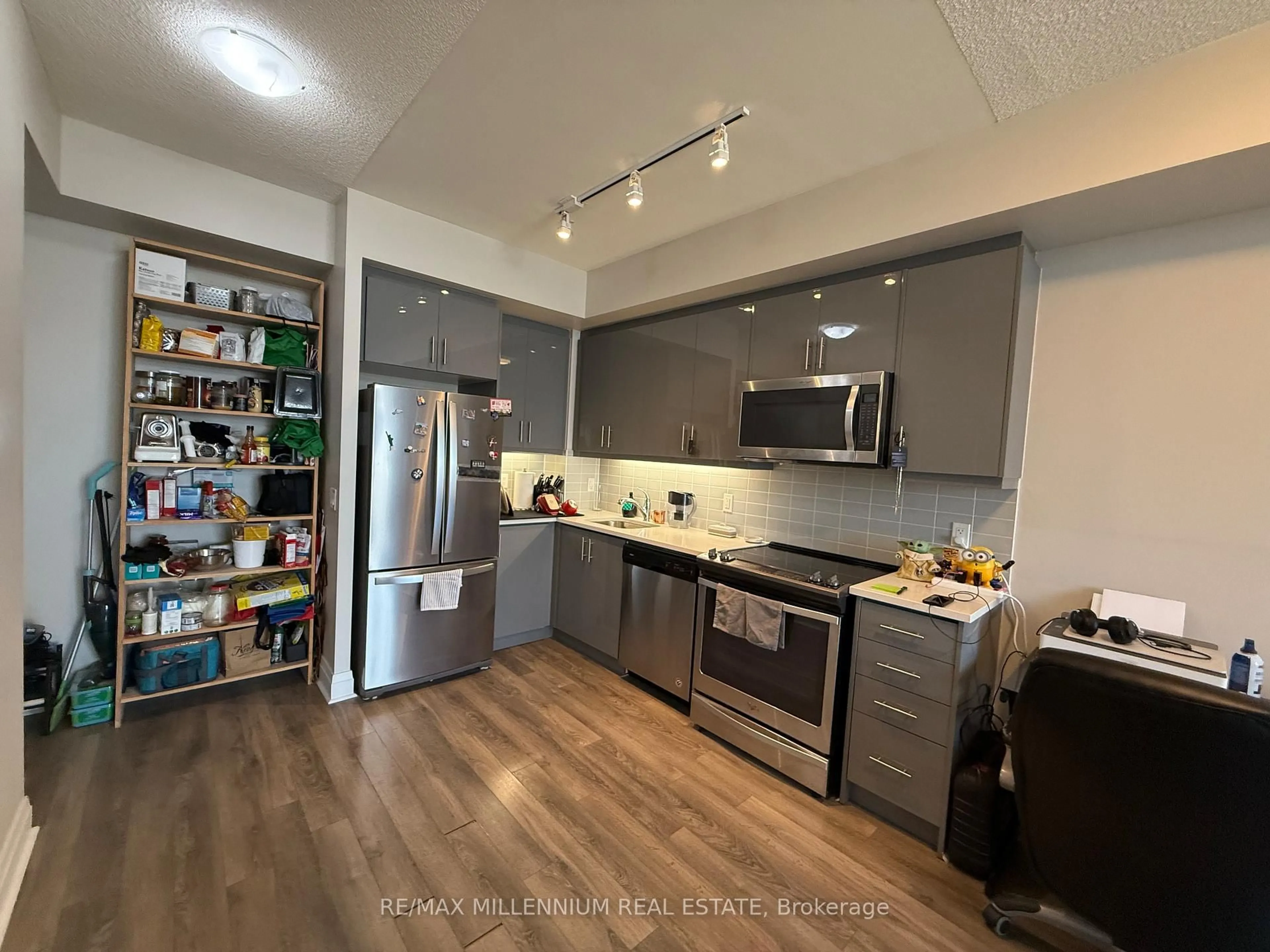 Open concept kitchen, wood/laminate floor for 17 Zorra St #1801, Toronto Ontario M8Z 4Z6