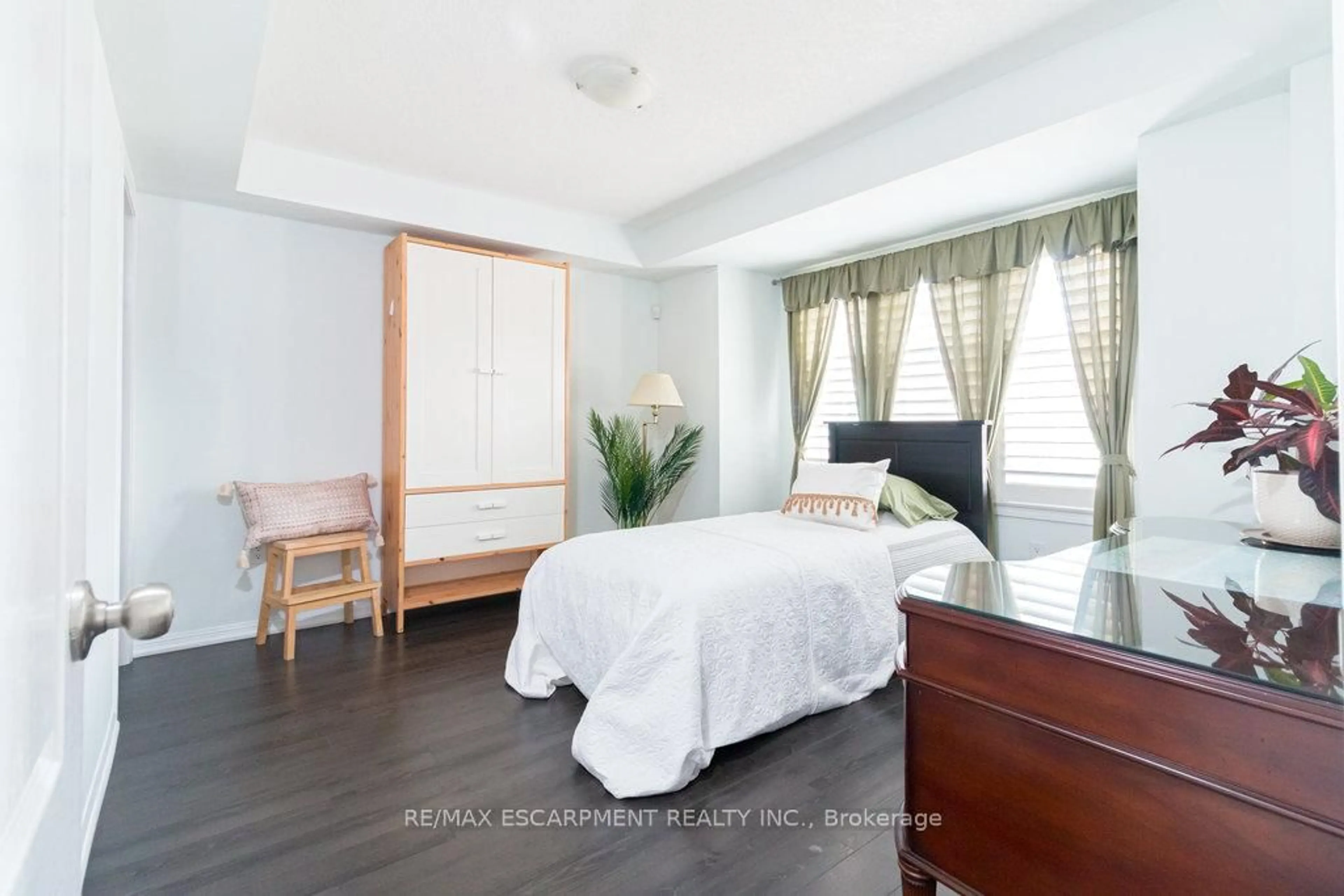 Bedroom with bed, wood/laminate floor for 668 Sellers Path, Milton Ontario L9T 0P6