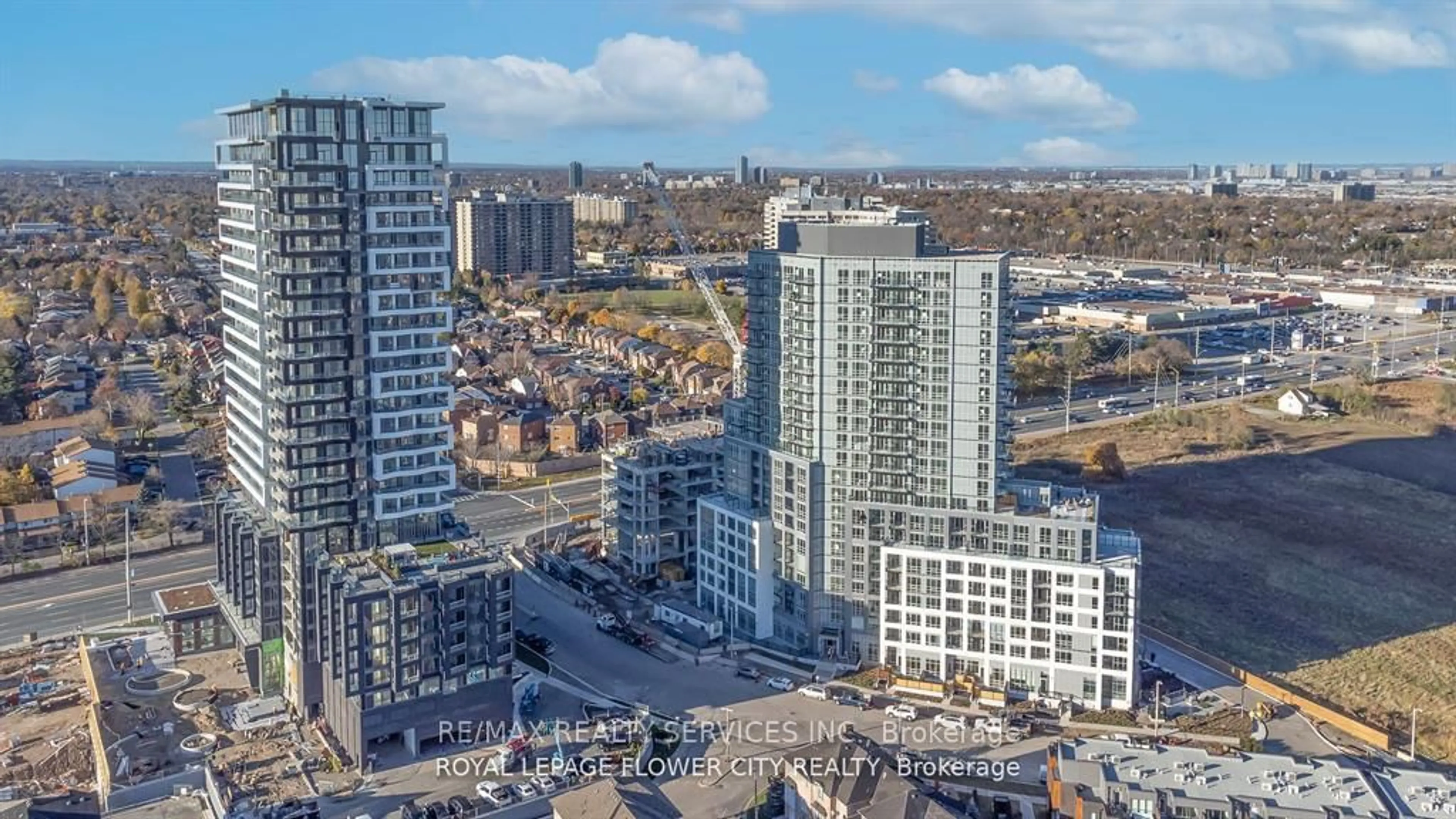 A pic from outside/outdoor area/front of a property/back of a property/a pic from drone, city buildings view from balcony for 225 Malta Ave #513, Brampton Ontario L6Y 6L6