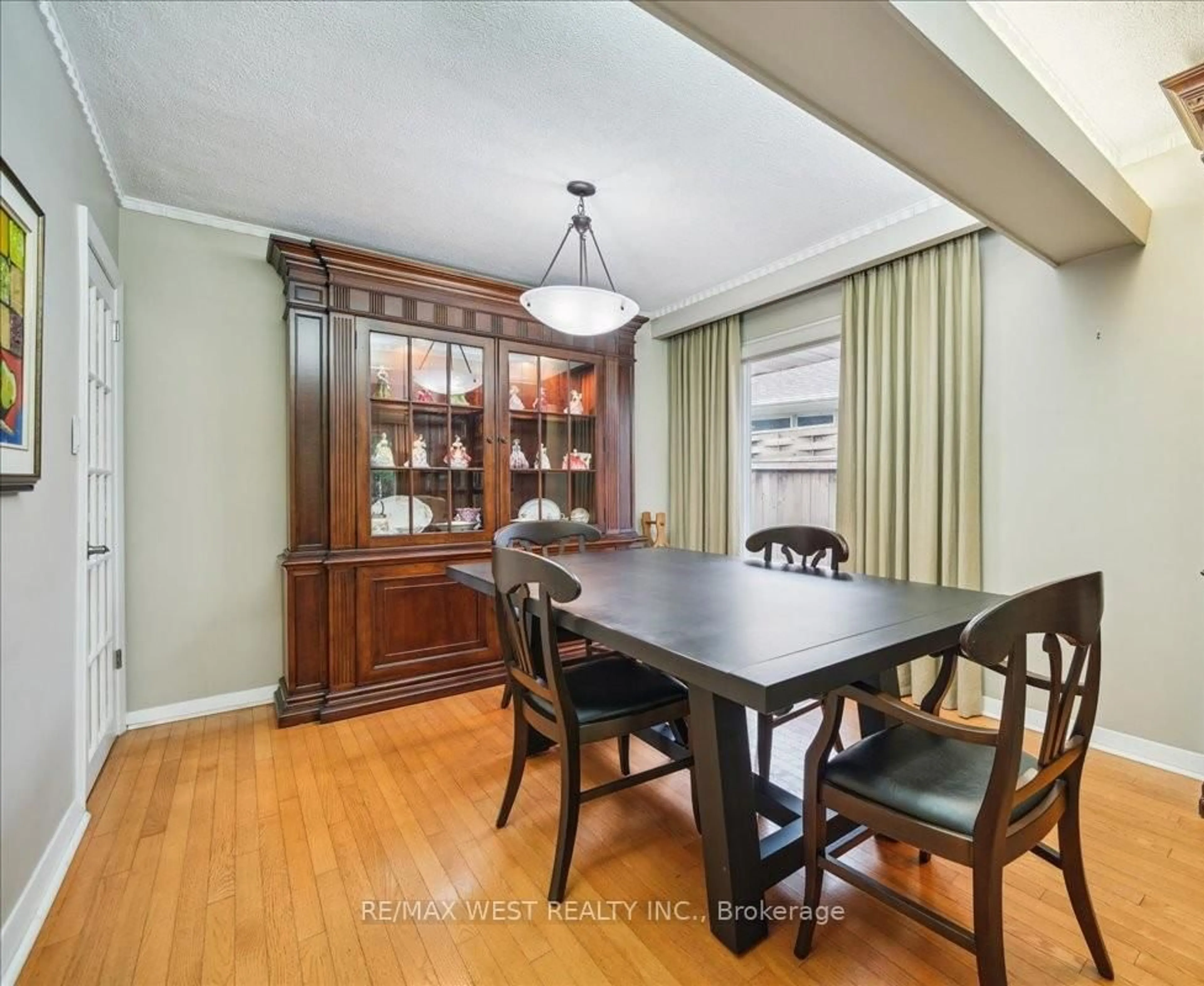 Dining room, wood/laminate floor for 27 Orkney Cres, Toronto Ontario M9A 2T4