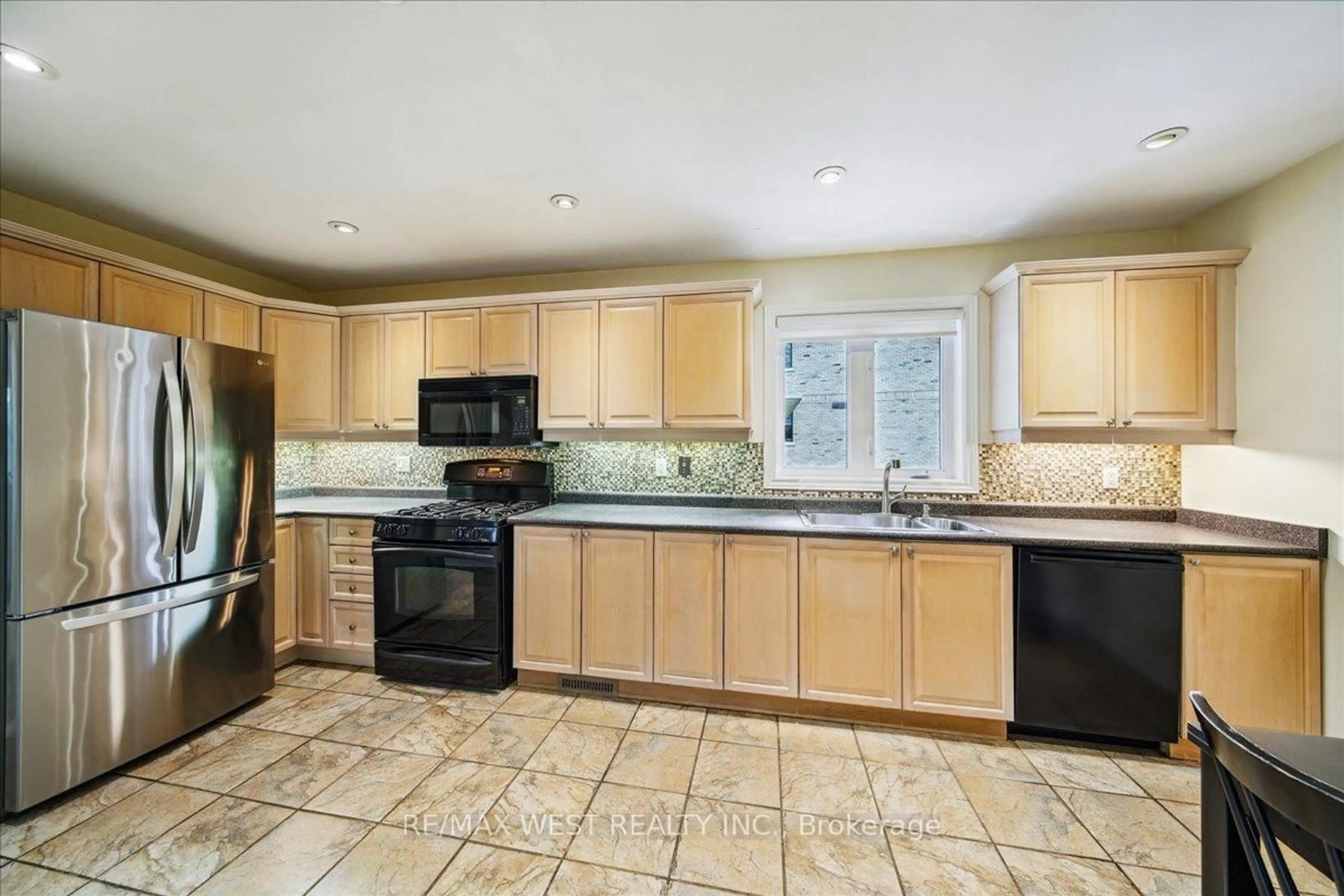 Standard kitchen, ceramic/tile floor for 27 Orkney Cres, Toronto Ontario M9A 2T4