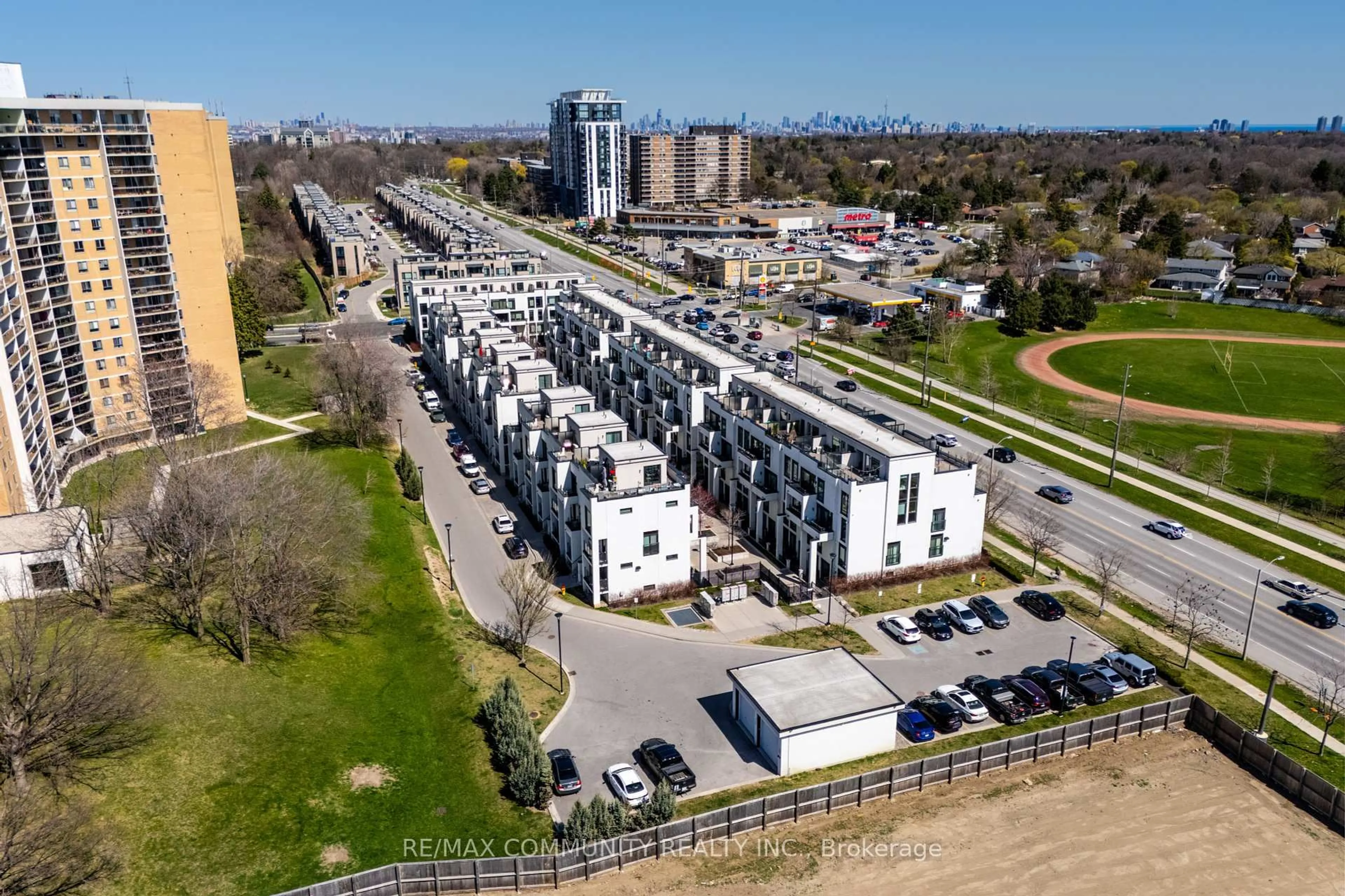 A pic from outside/outdoor area/front of a property/back of a property/a pic from drone, unknown for 134 Widdicombe Hill Blvd #212, Toronto Ontario M9R 0A9