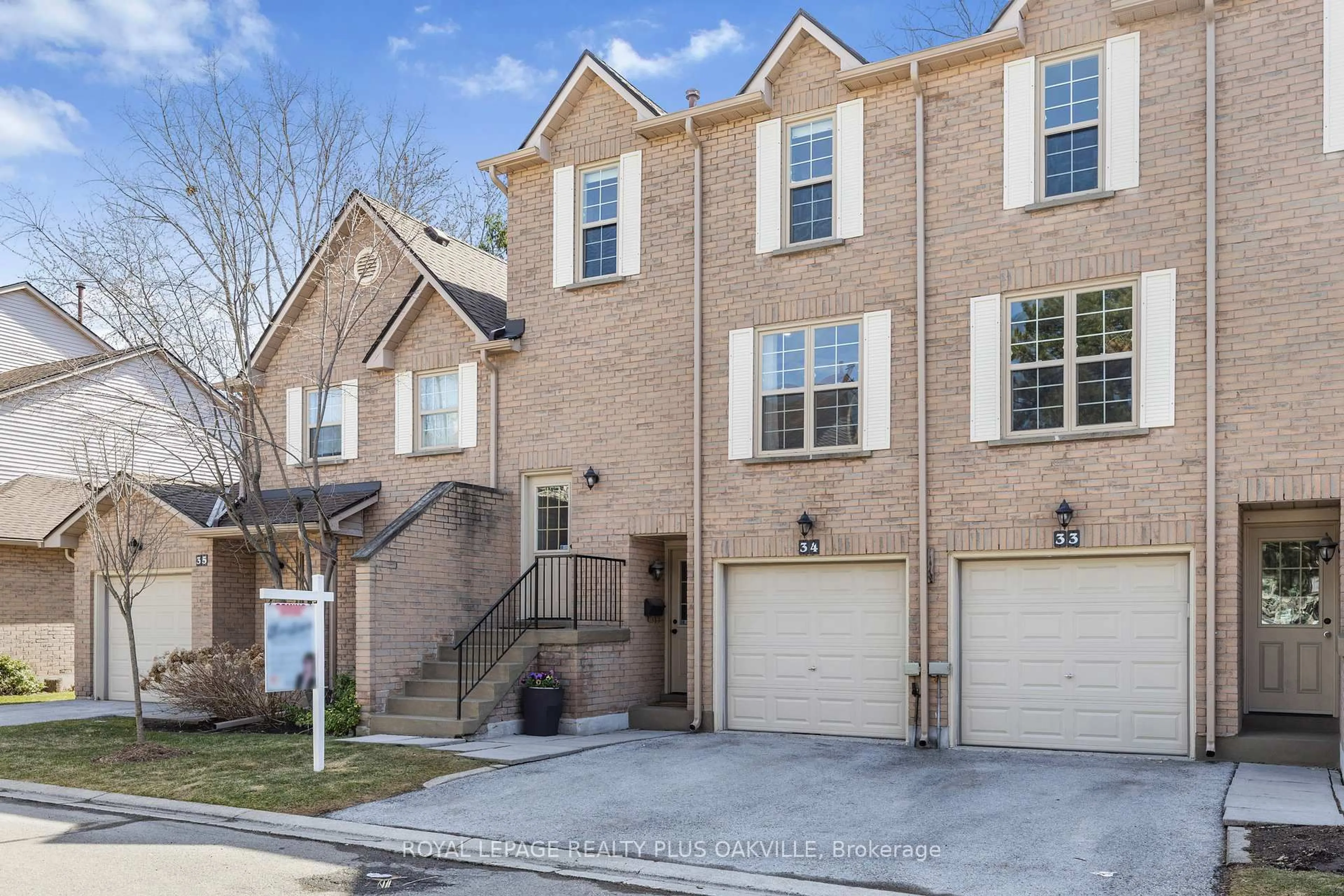Home with brick exterior material, street for 2272 Mowat Ave #34, Oakville Ontario L6H 5L8