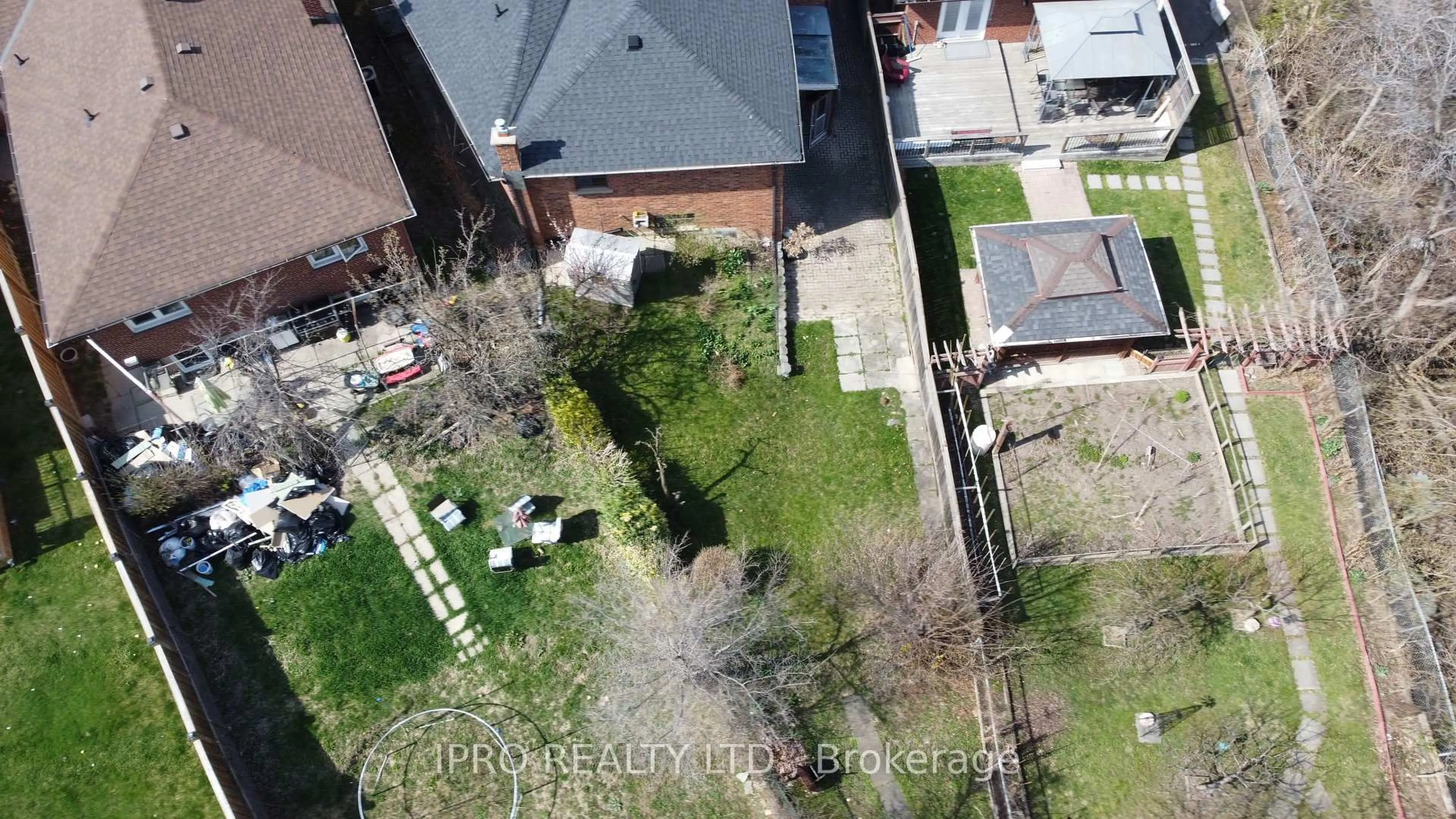 A pic from outside/outdoor area/front of a property/back of a property/a pic from drone, street for 577 Rustic Rd, Toronto Ontario M6L 1Y2
