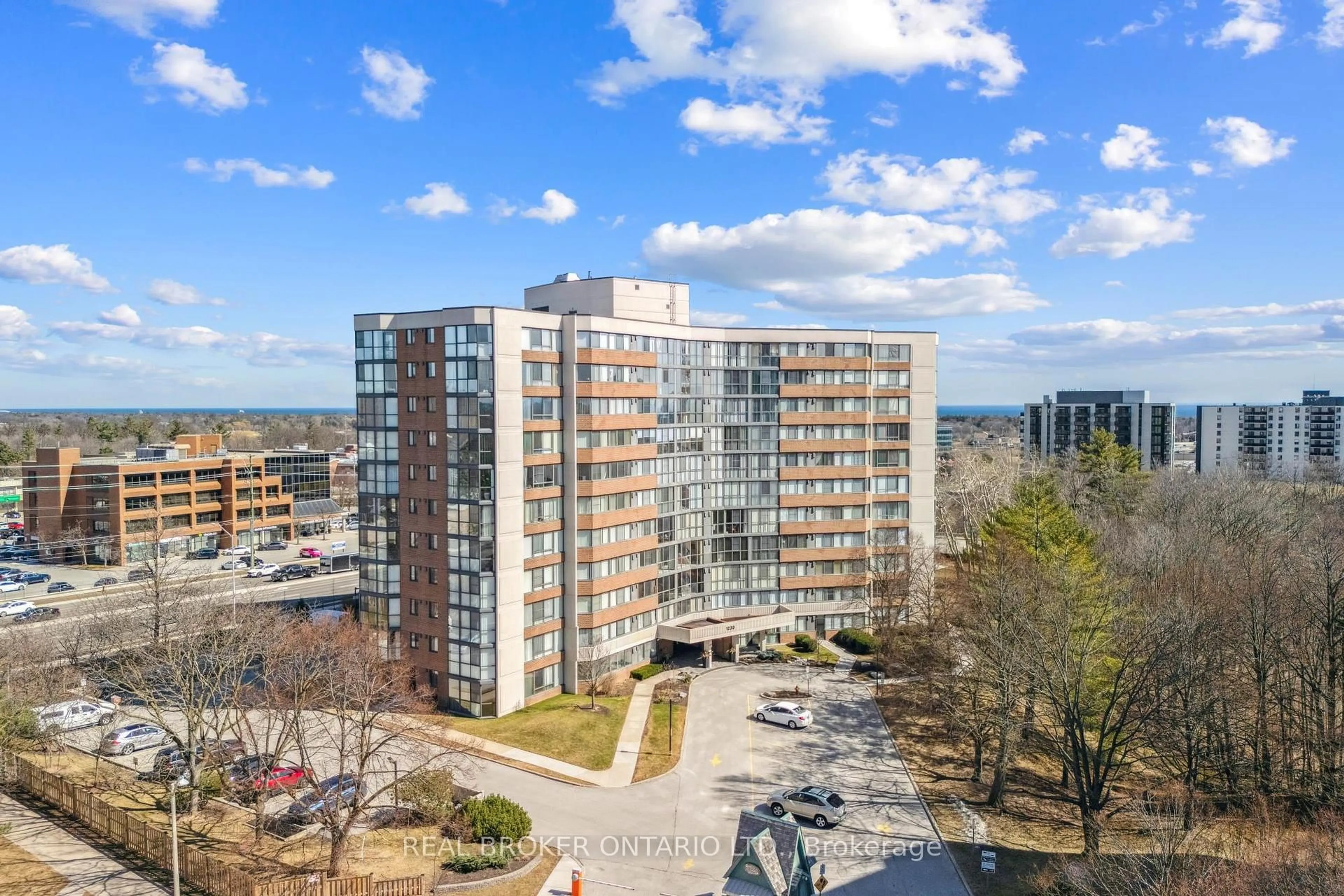 A pic from outside/outdoor area/front of a property/back of a property/a pic from drone, city buildings view from balcony for 1230 Marlborough Crt #506, Oakville Ontario L6H 3K6