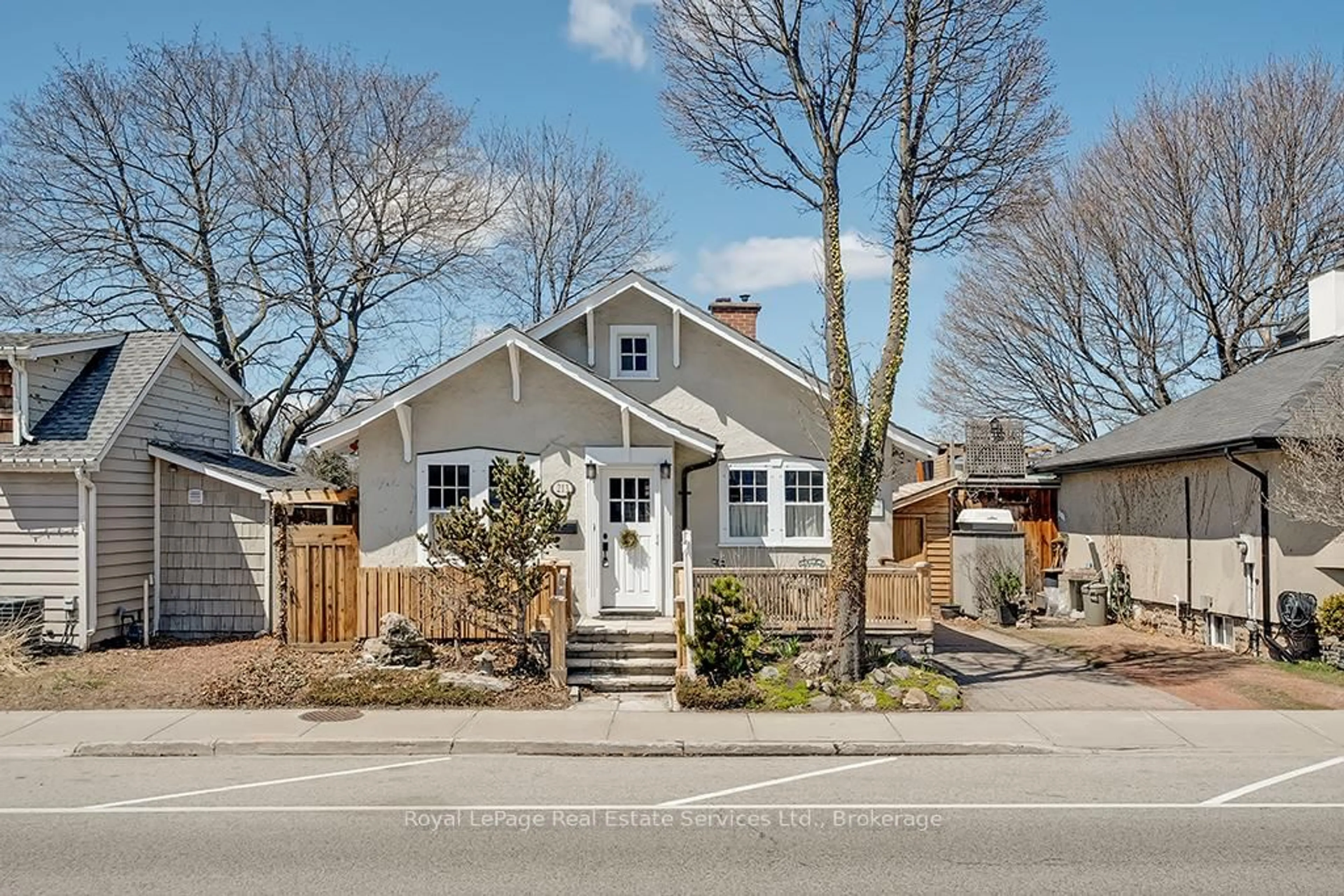 Home with vinyl exterior material, street for 213 Randall St, Oakville Ontario L6J 1P5