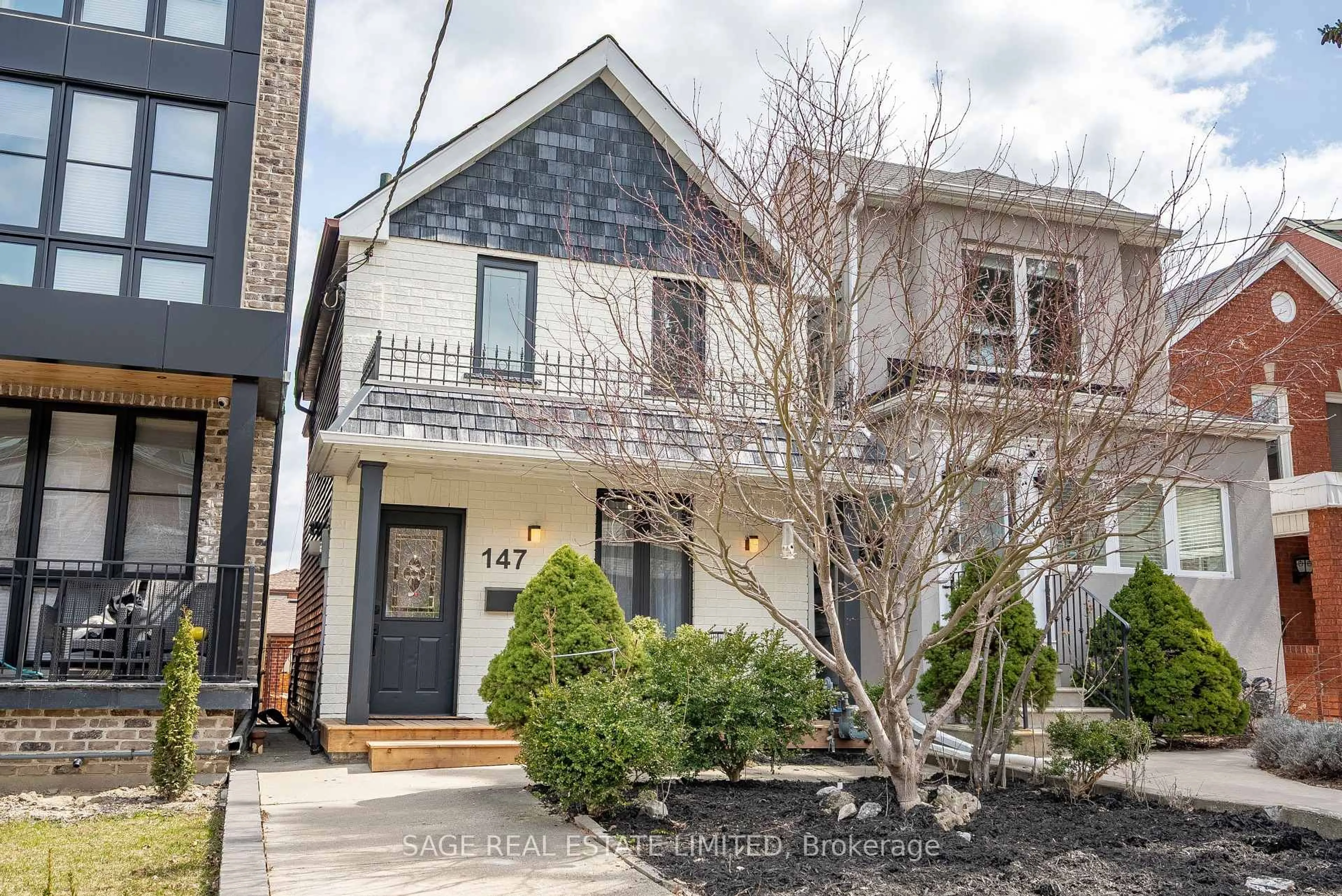 Home with brick exterior material, street for 147 Boon Ave, Toronto Ontario M6E 3Z6