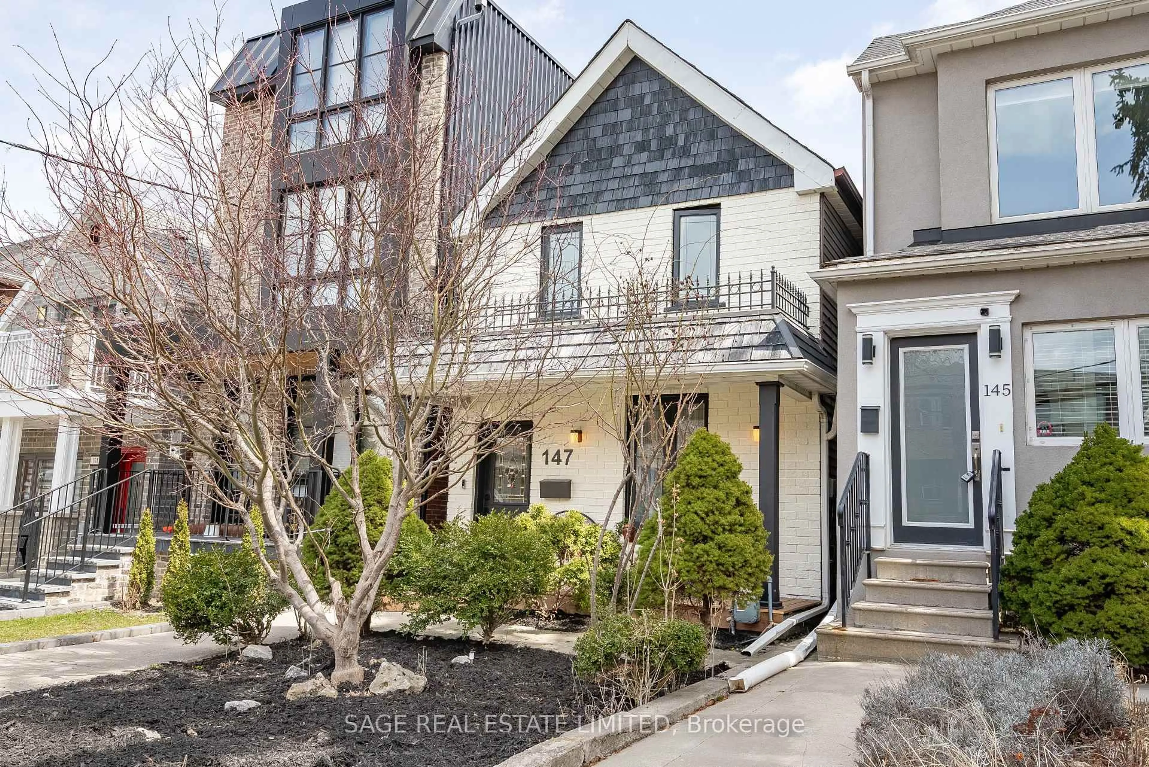 Home with brick exterior material, street for 147 Boon Ave, Toronto Ontario M6E 3Z6