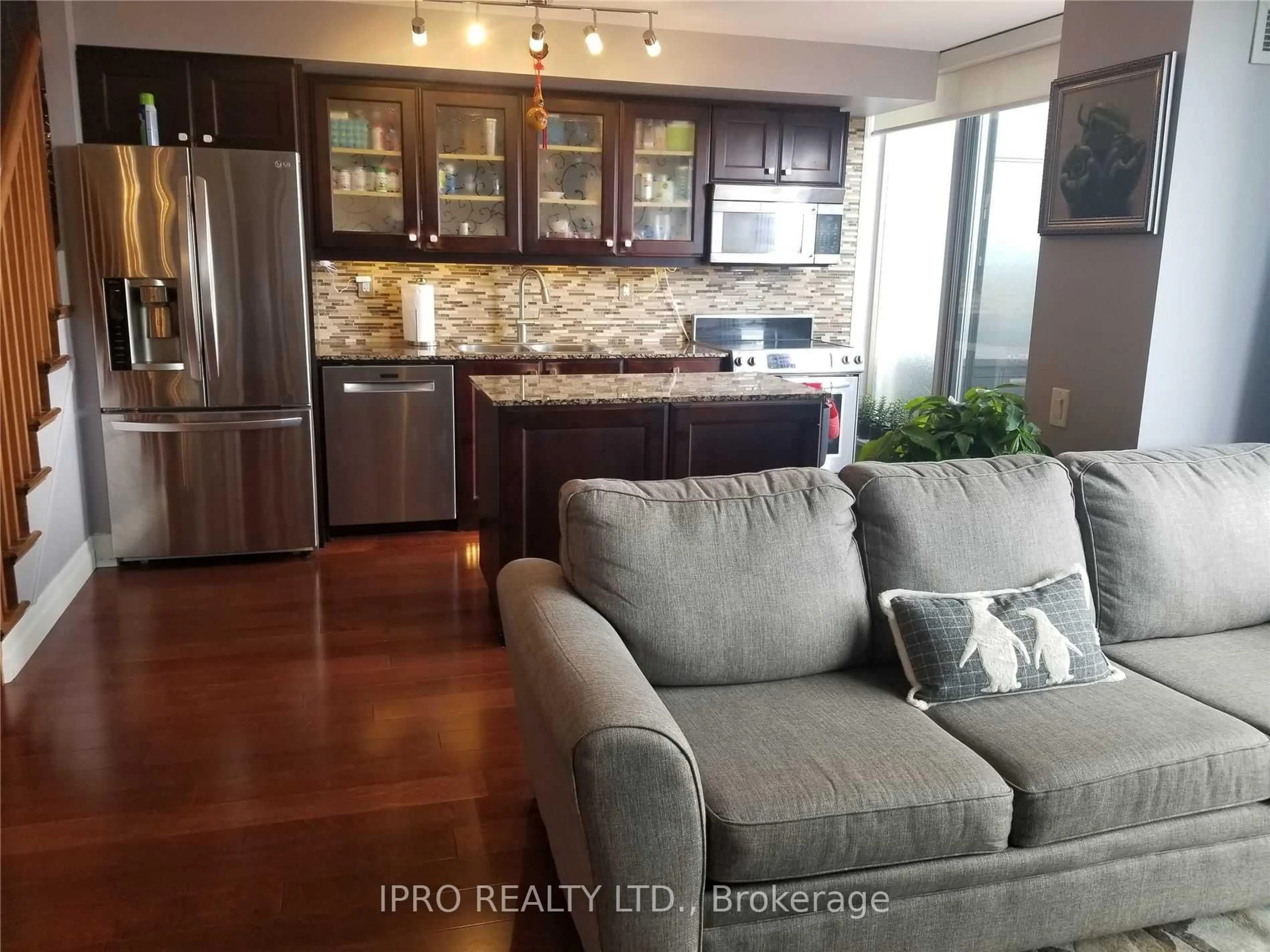 Open concept kitchen, wood/laminate floor for 1040 The Queensway Ave #PH919, Toronto Ontario M8Z 0A7