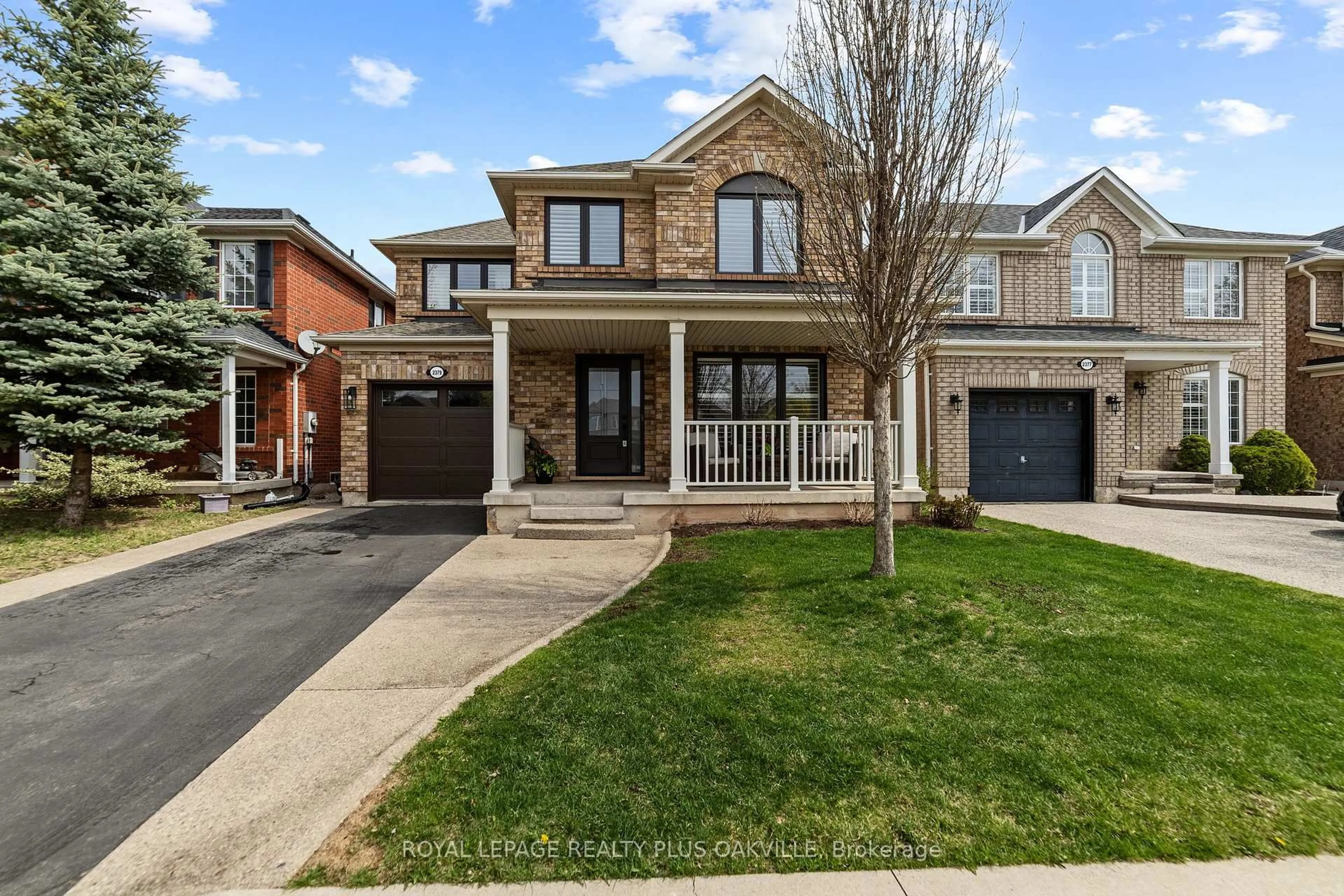 Home with brick exterior material, street for 2379 Proudfoot Tr, Oakville Ontario L6M 4X9