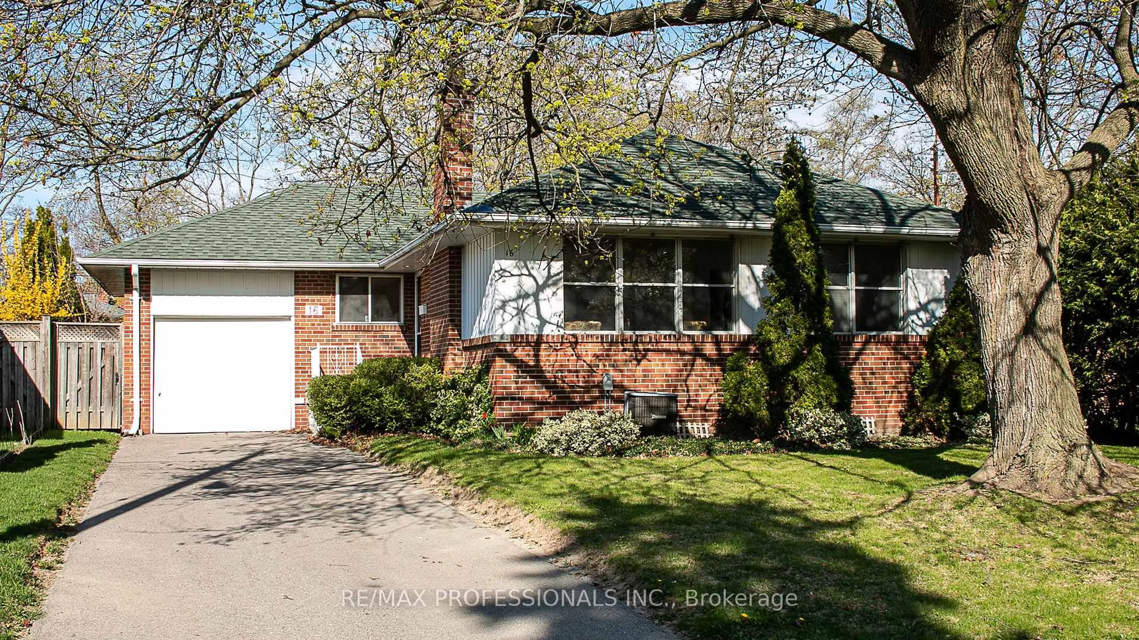 Home with brick exterior material, street for 16 Dornoch Dr, Toronto Ontario M9B 4N8