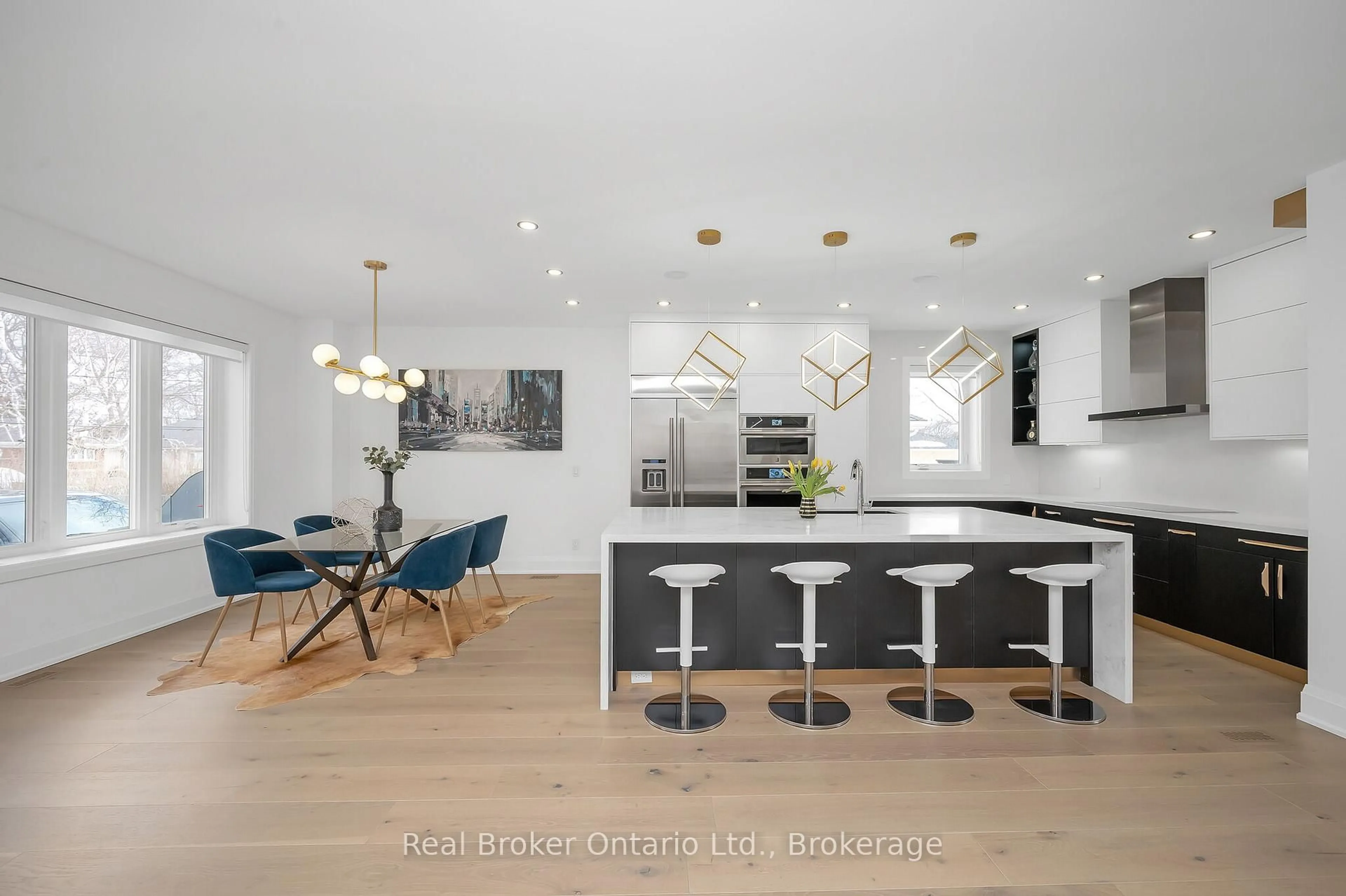 Open concept kitchen, wood/laminate floor for 396 River Side Dr, Oakville Ontario L6K 3N7
