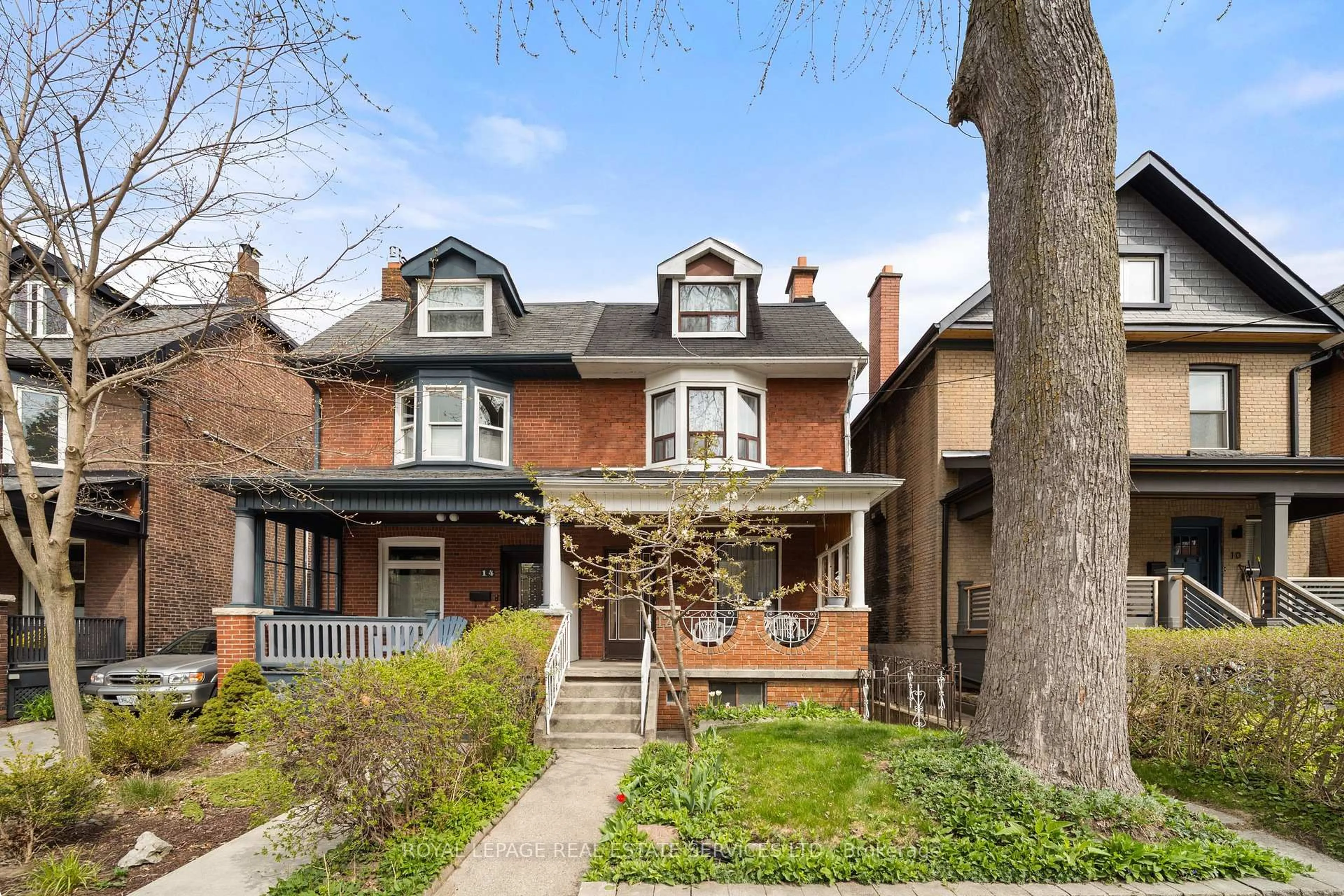 Home with brick exterior material, street for 12 Fermanagh Ave, Toronto Ontario M6R 1M2