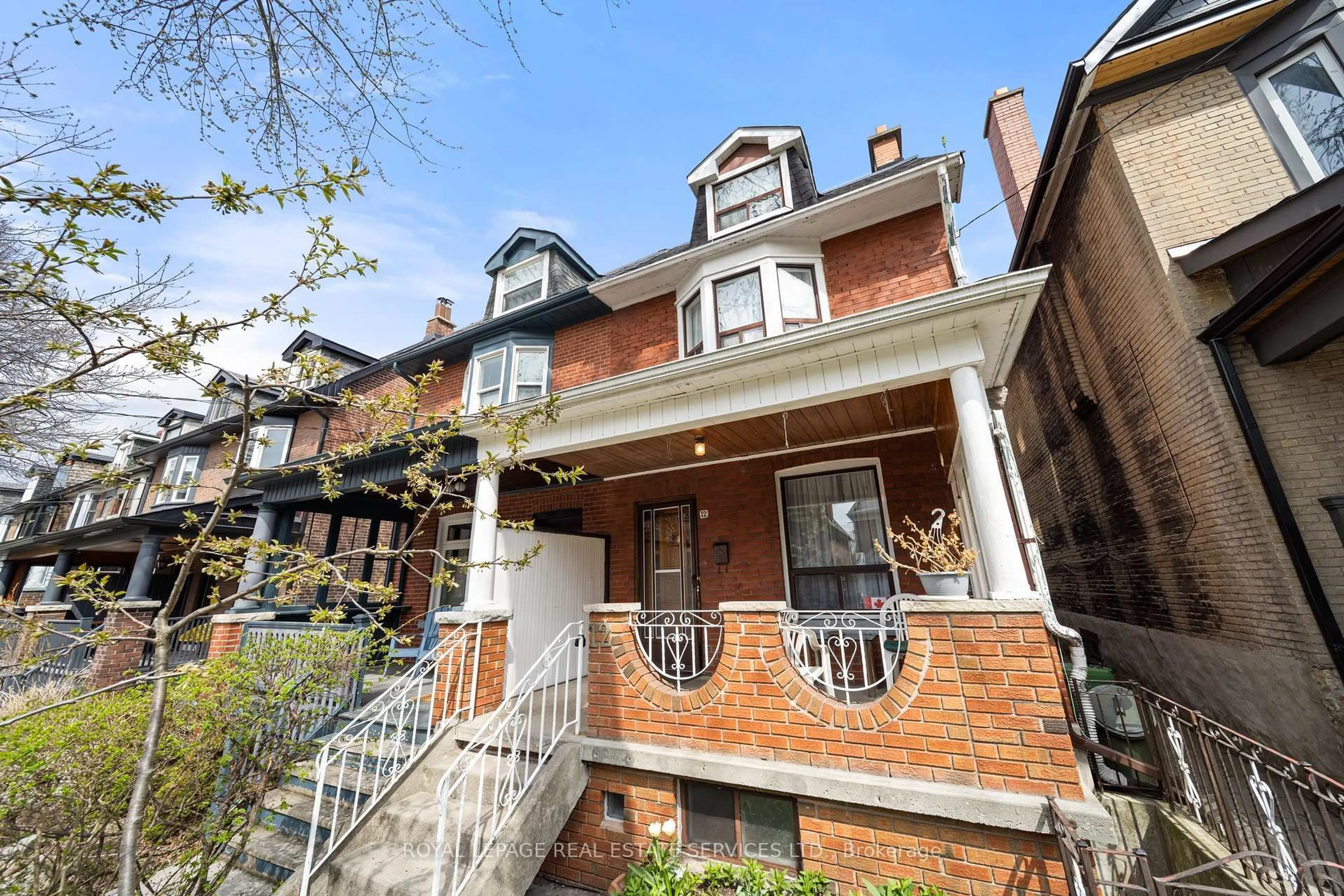 Home with brick exterior material, street for 12 Fermanagh Ave, Toronto Ontario M6R 1M2