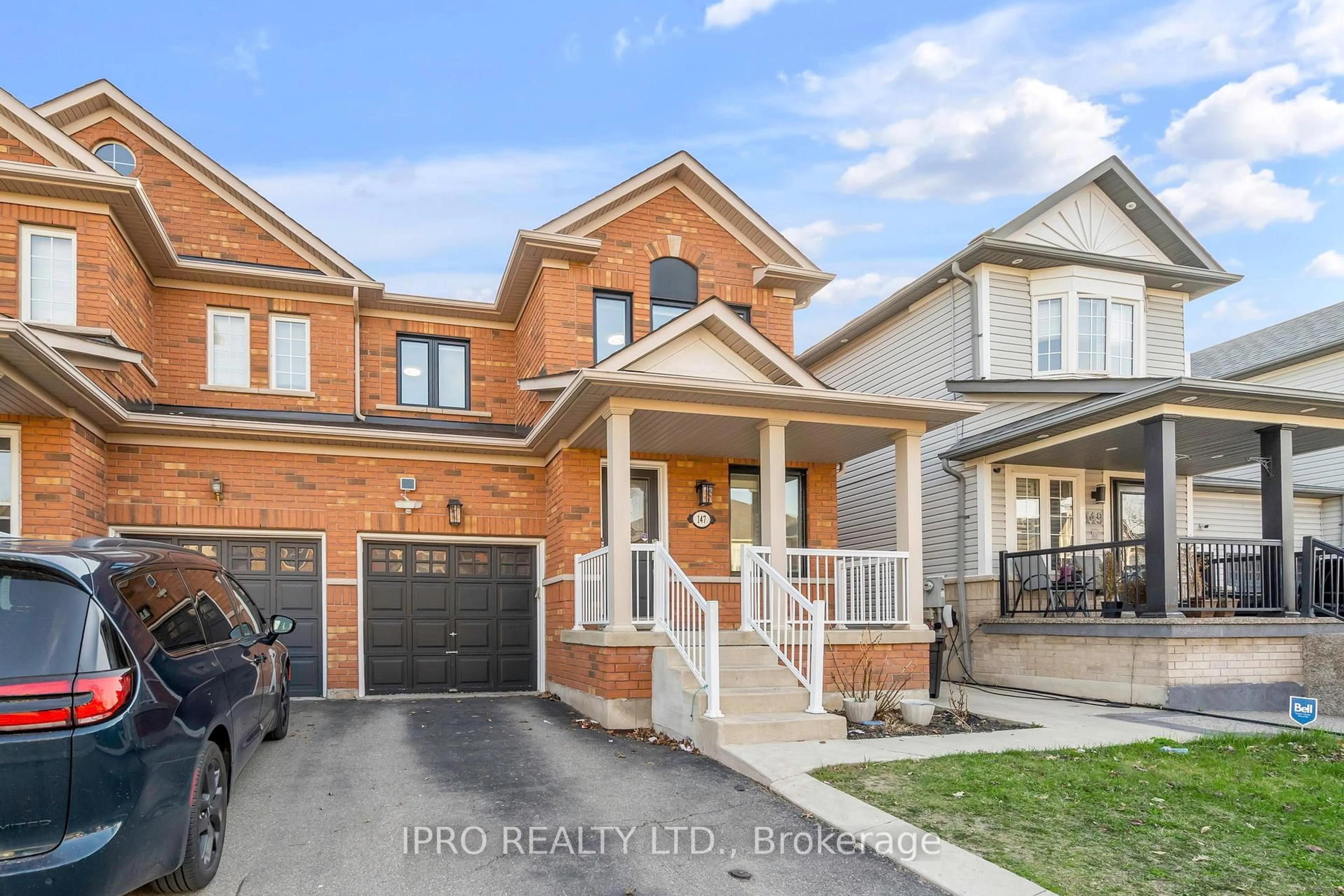 Home with brick exterior material, street for 147 Waters Blvd, Milton Ontario L9T 6K5