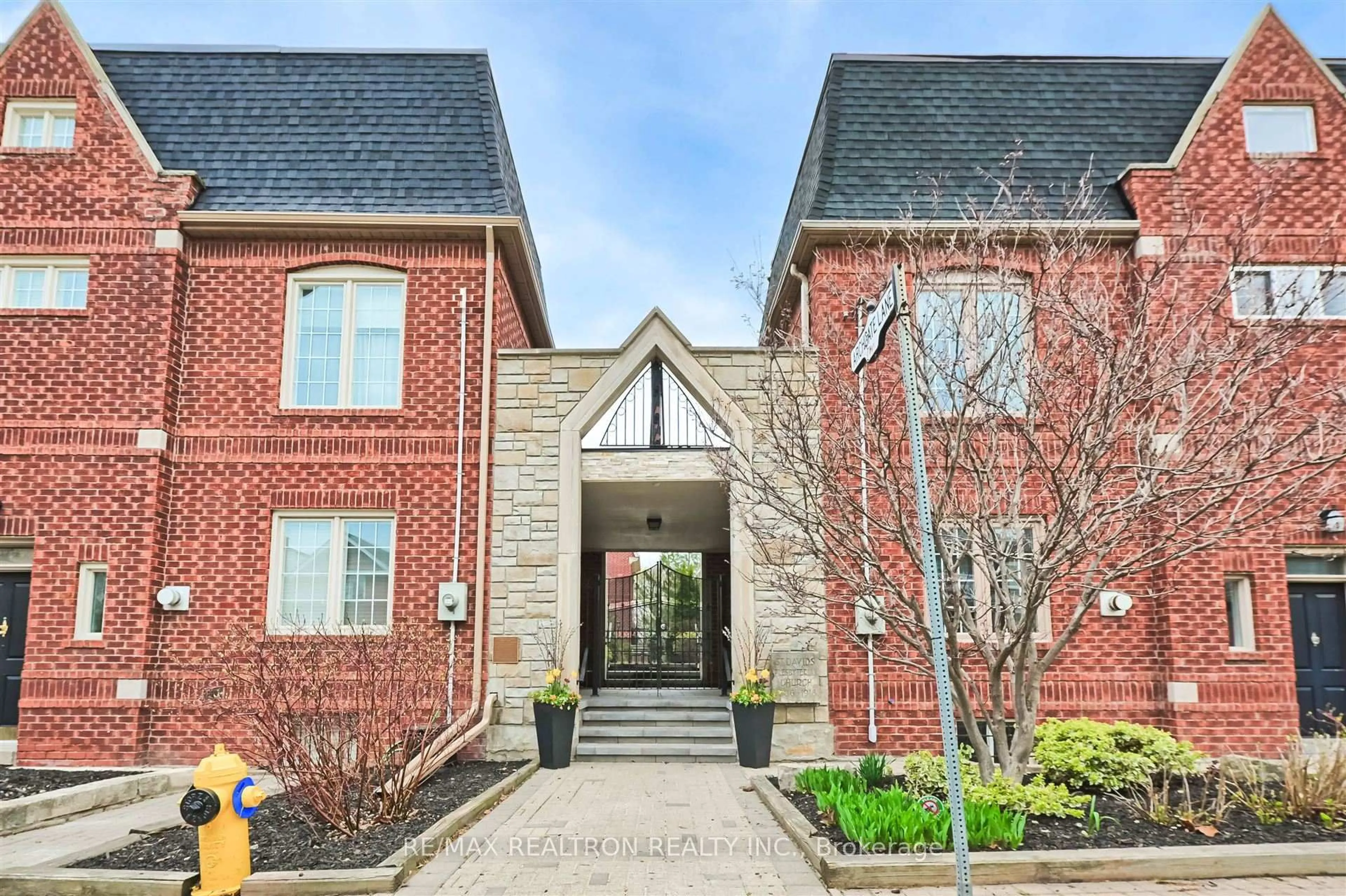 Home with brick exterior material, street for 4 Archgate Lane, Toronto Ontario M6E 5B1