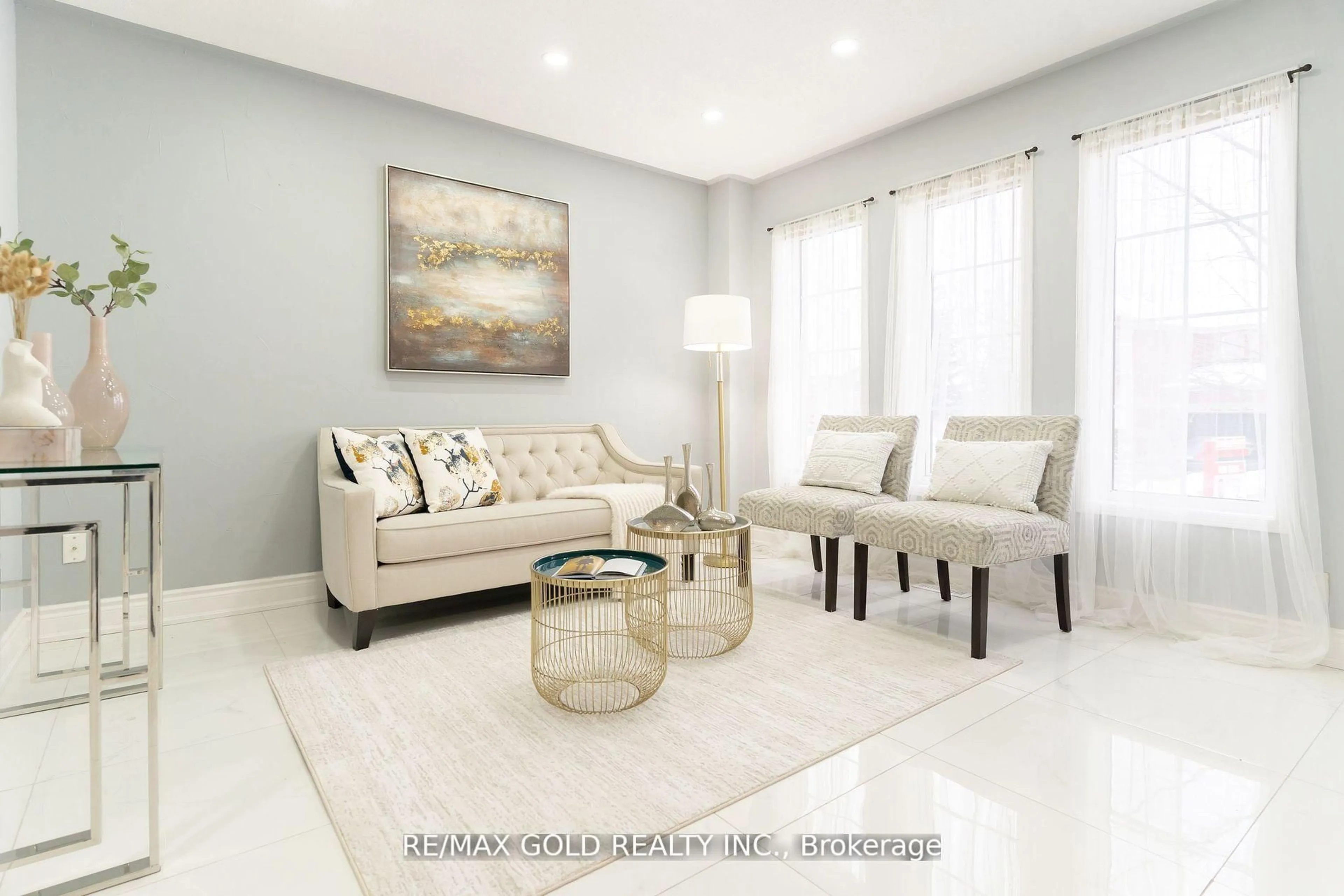 Living room with furniture, ceramic/tile floor for 3 Great Plains St, Brampton Ontario L6R 1Z5