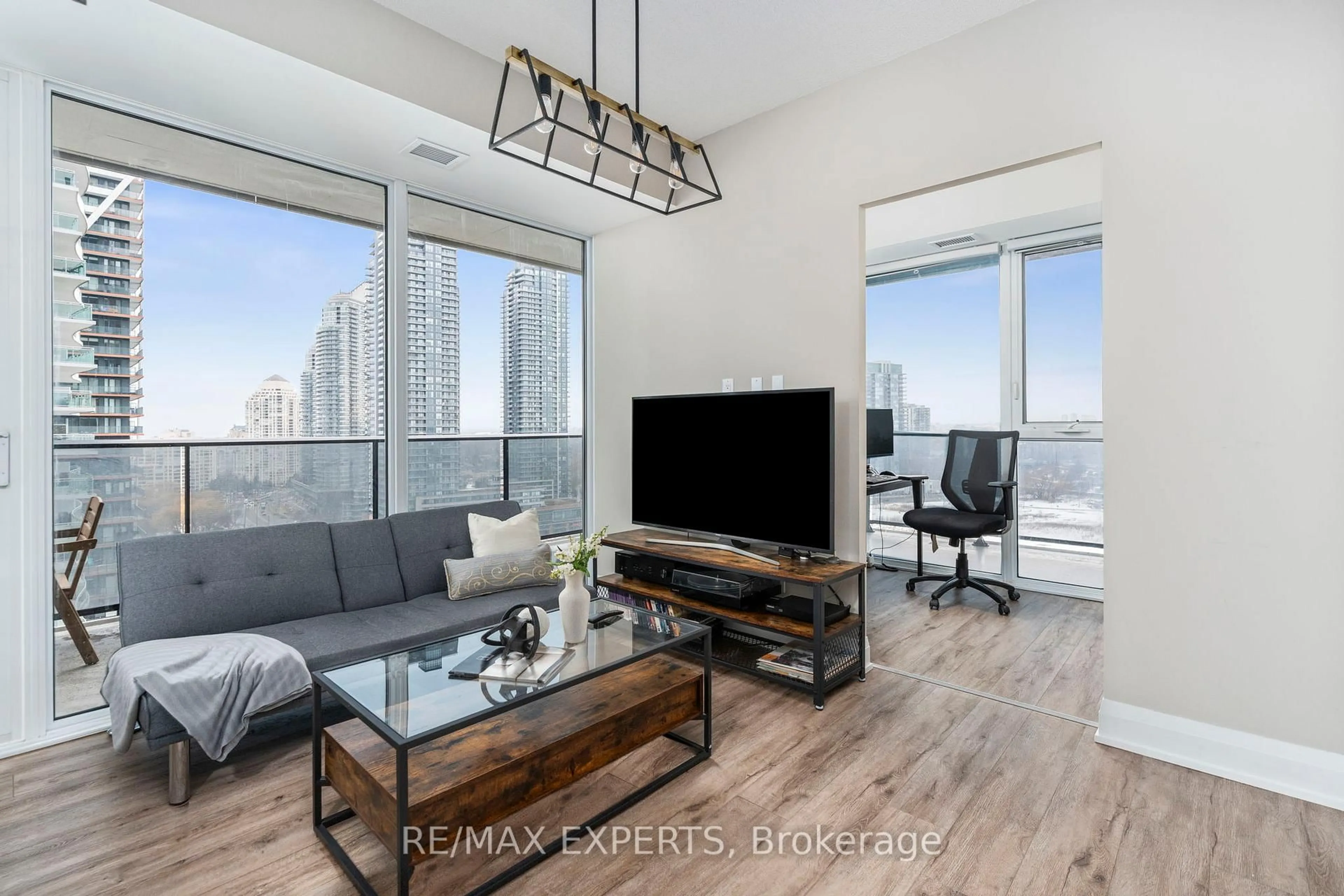 Living room with furniture, wood/laminate floor for 70 Annie Craig Dr #1609, Toronto Ontario M8V 0G2