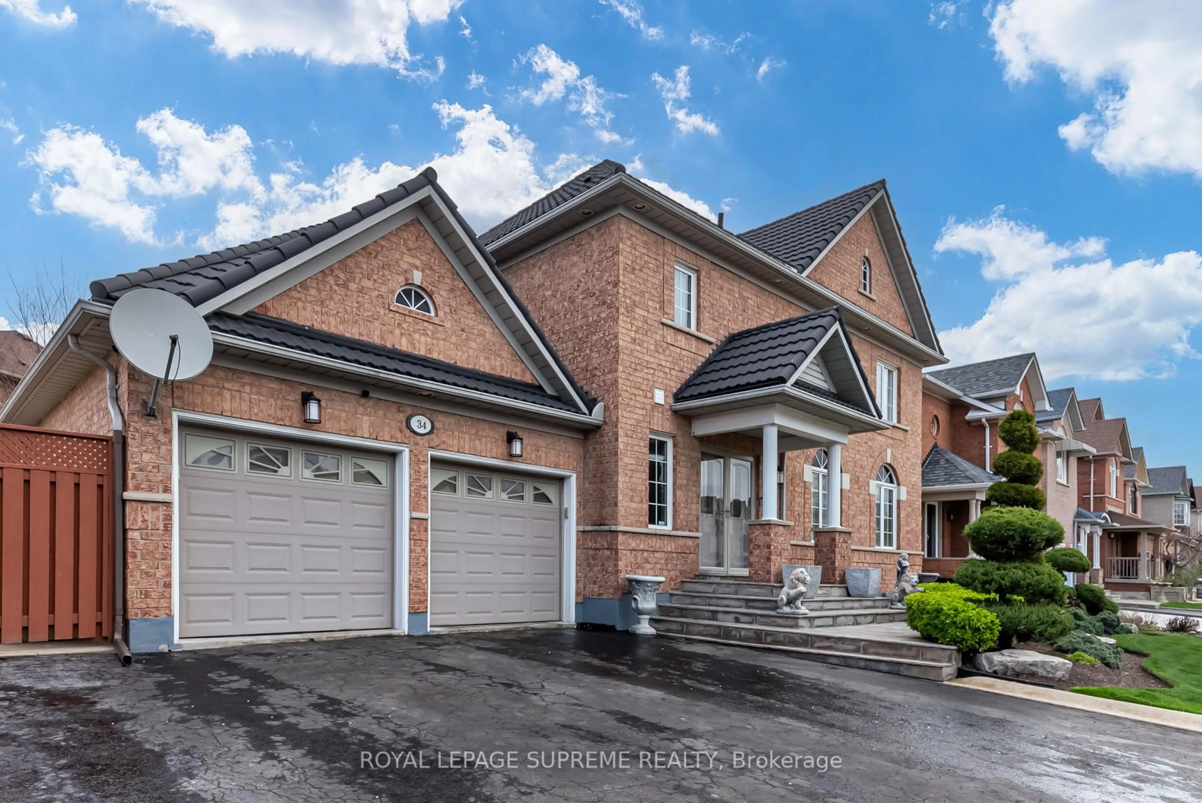 Home with brick exterior material, street for 34 Purdy Cres, Toronto Ontario M9N 3X7