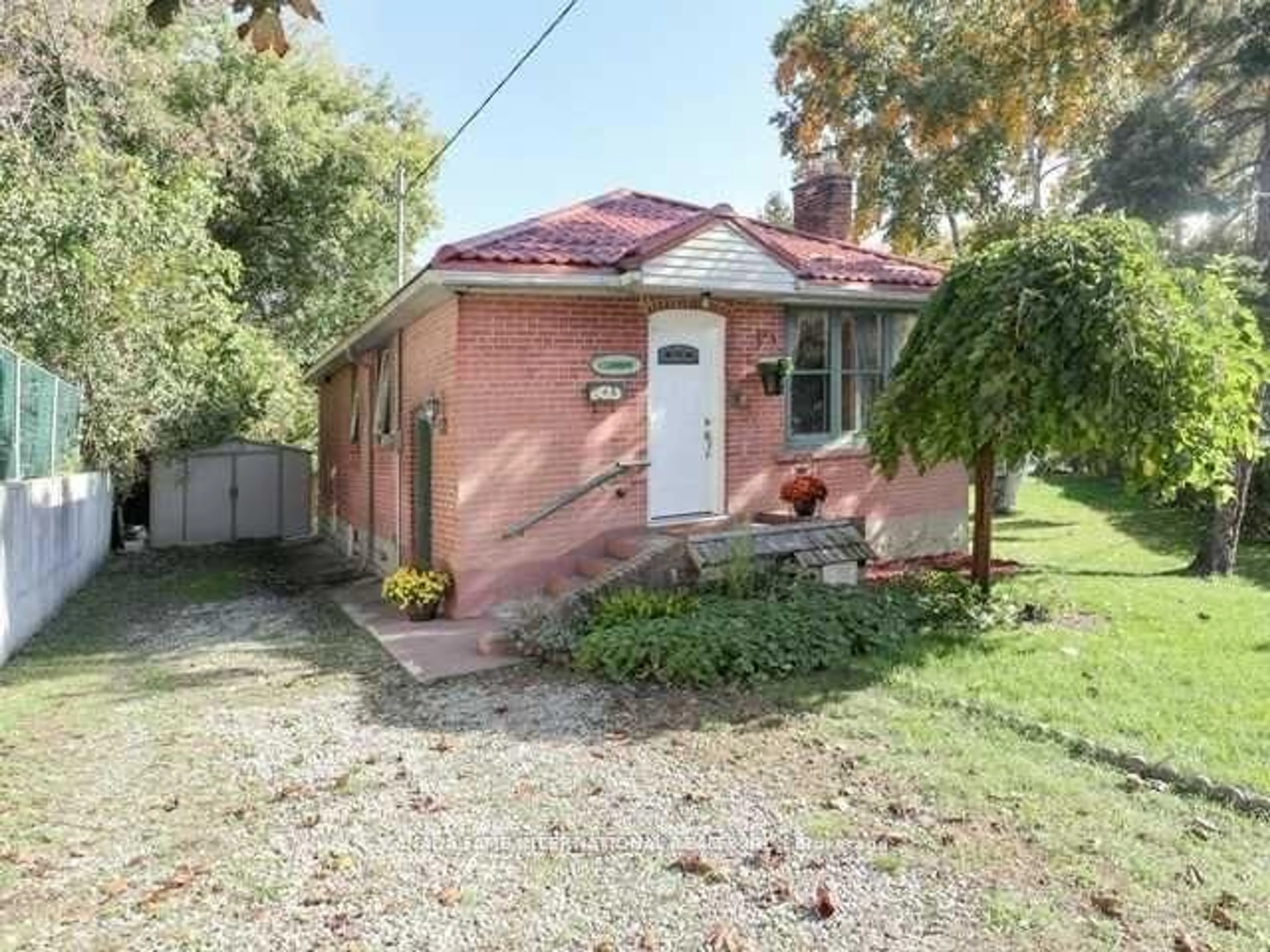 Home with brick exterior material, street for 1 Lundy Ave, Toronto Ontario M6S 4S8