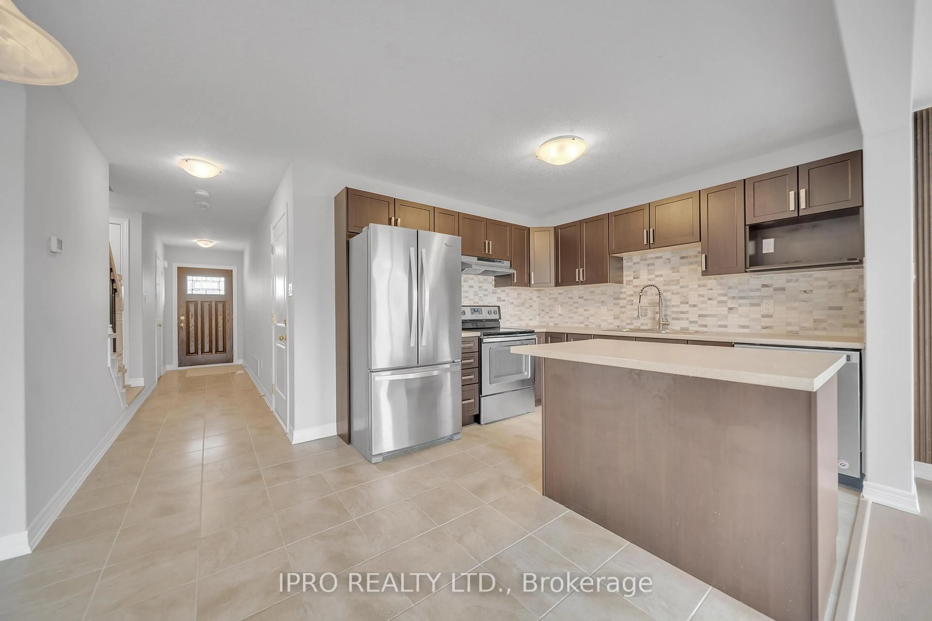 Open concept kitchen, ceramic/tile floor for 124 Parkinson Cres #22, Orangeville Ontario L9W 6X3