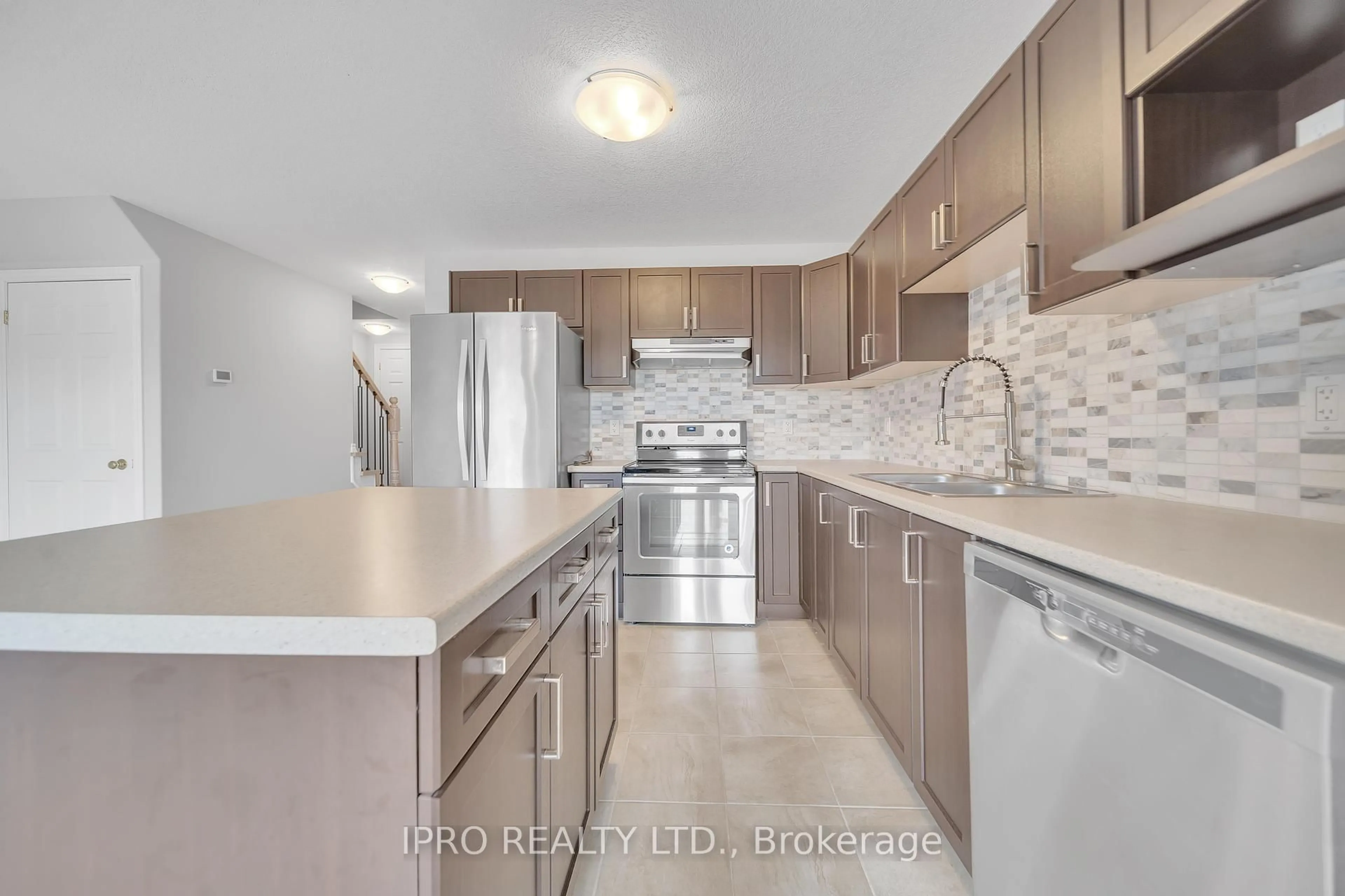Open concept kitchen, ceramic/tile floor for 124 Parkinson Cres #22, Orangeville Ontario L9W 6X3