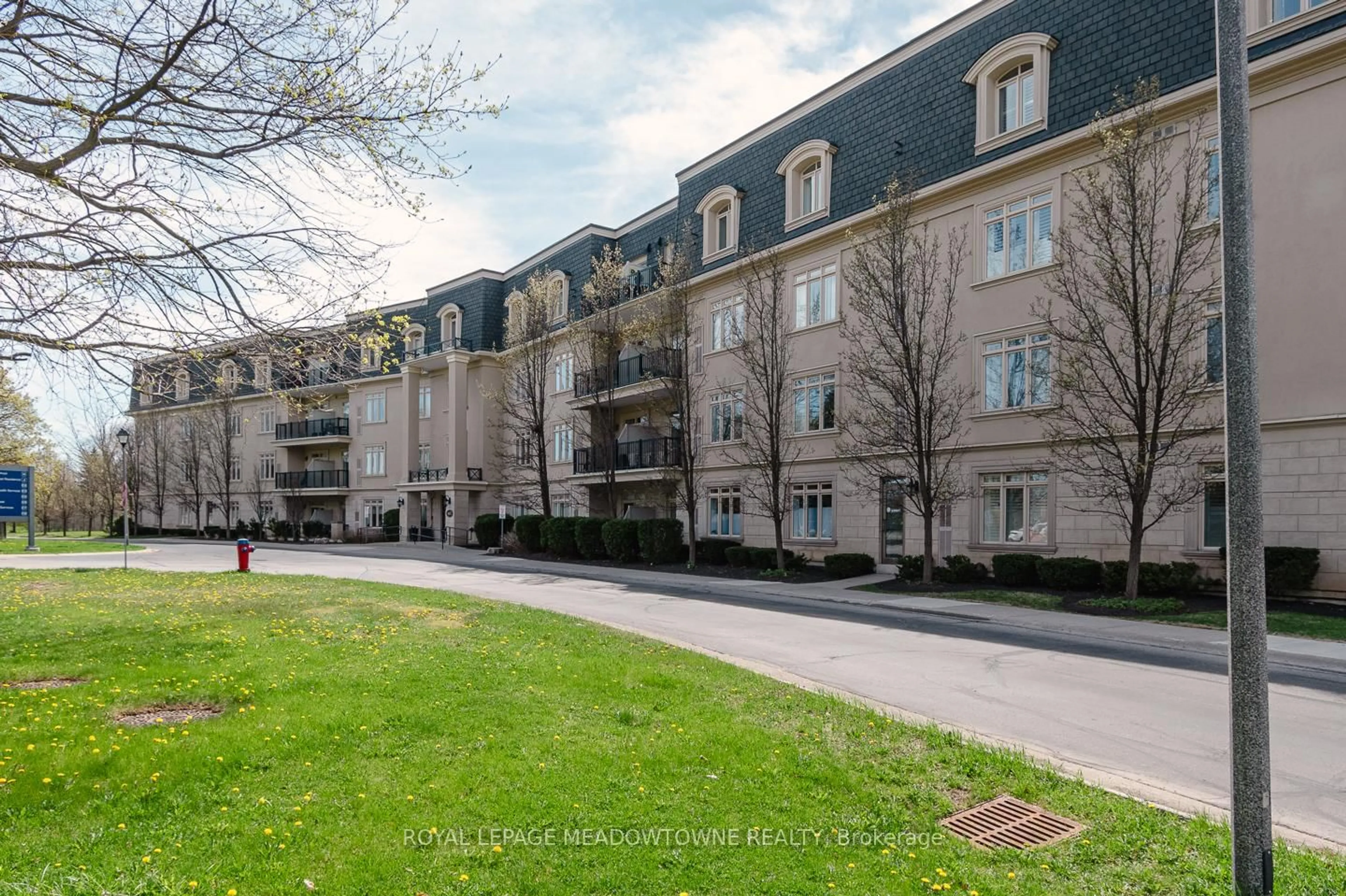 A pic from outside/outdoor area/front of a property/back of a property/a pic from drone, street for 443 Centennial Forest Dr #212, Milton Ontario L9T 6A1