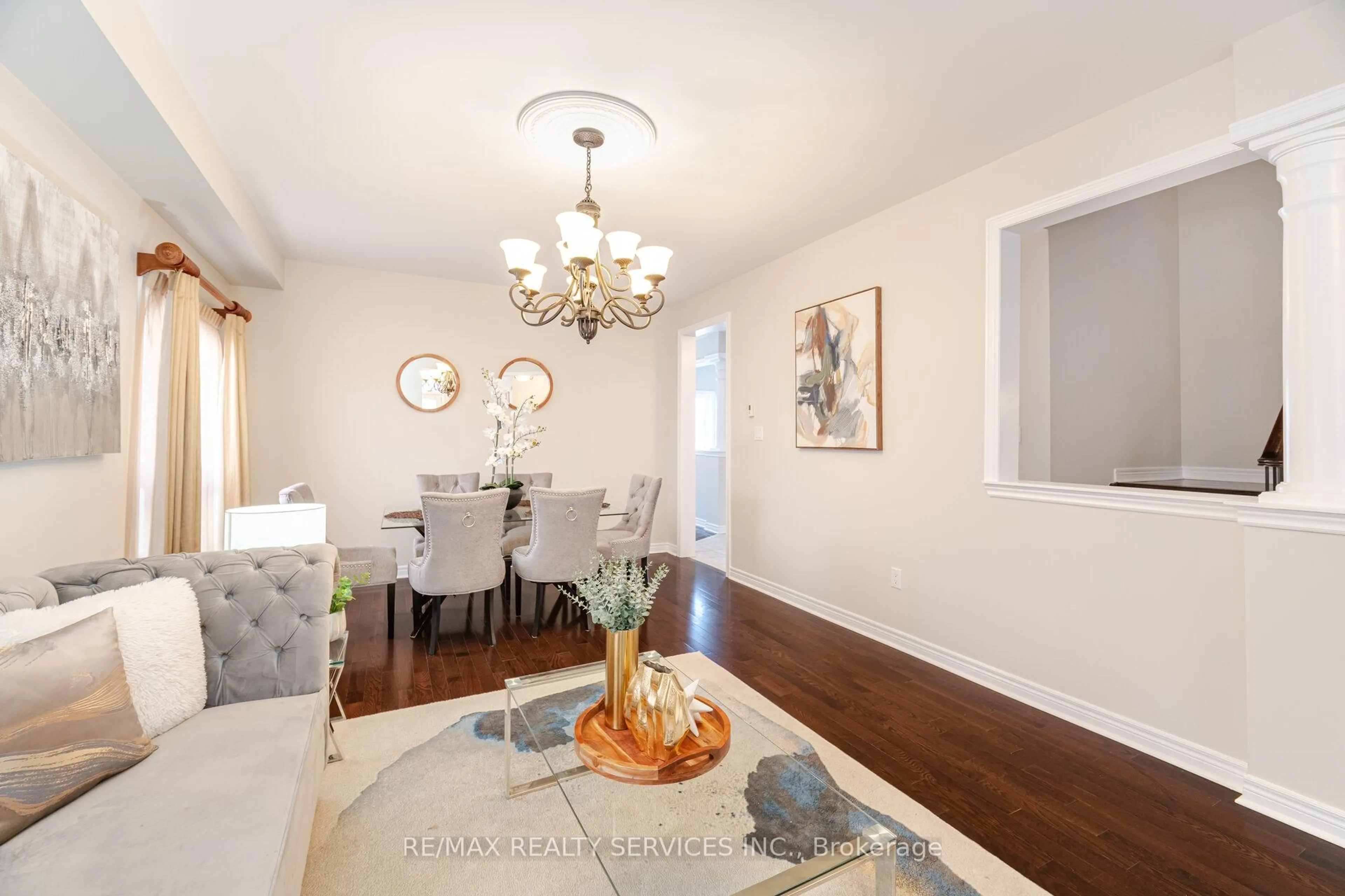 Dining room, wood/laminate floor for 21 Fallgate Dr, Brampton Ontario L6X 0R6