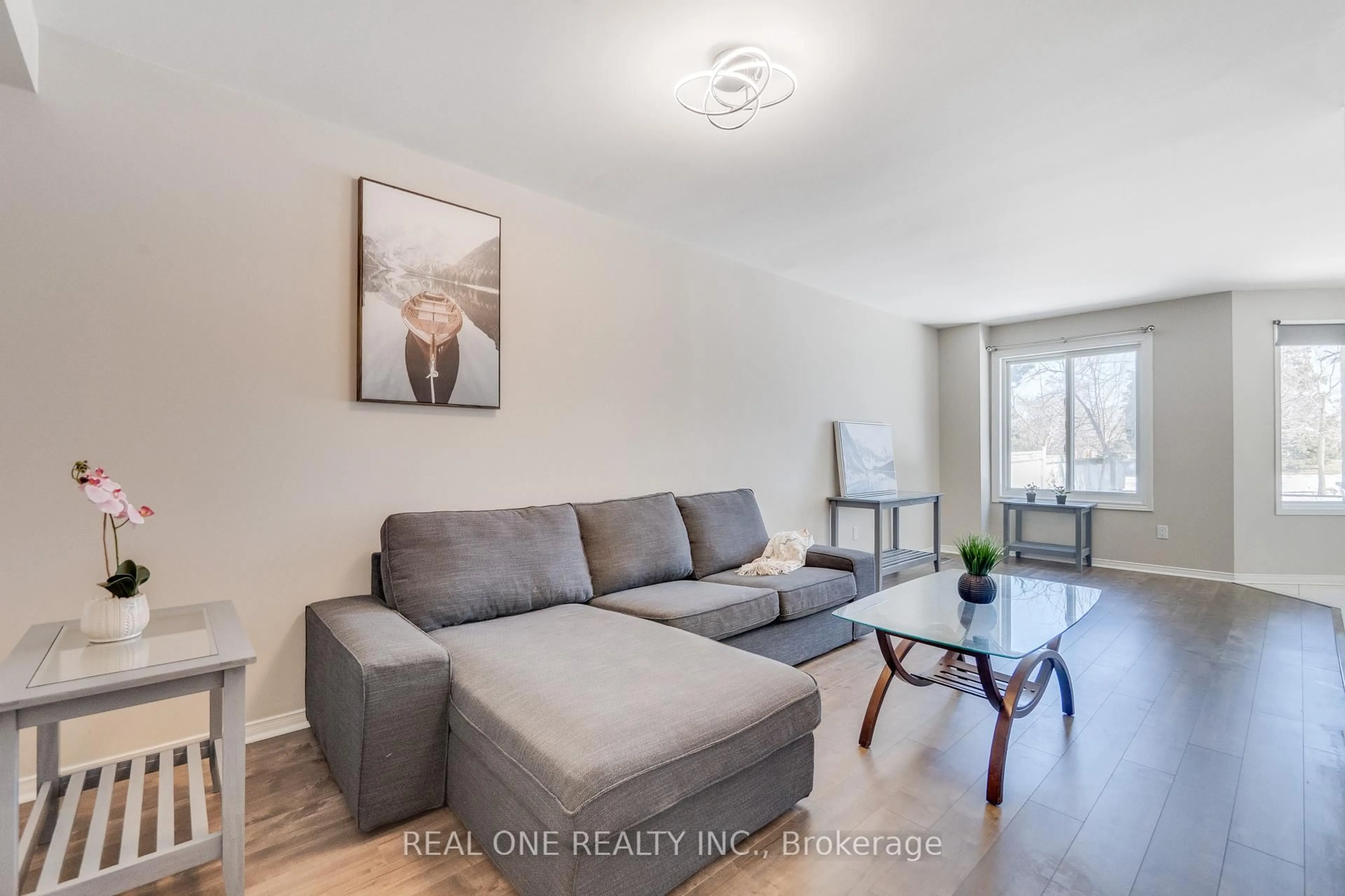 Living room with furniture, wood/laminate floor for 1132 Westview Terr, Oakville Ontario L6M 3M1