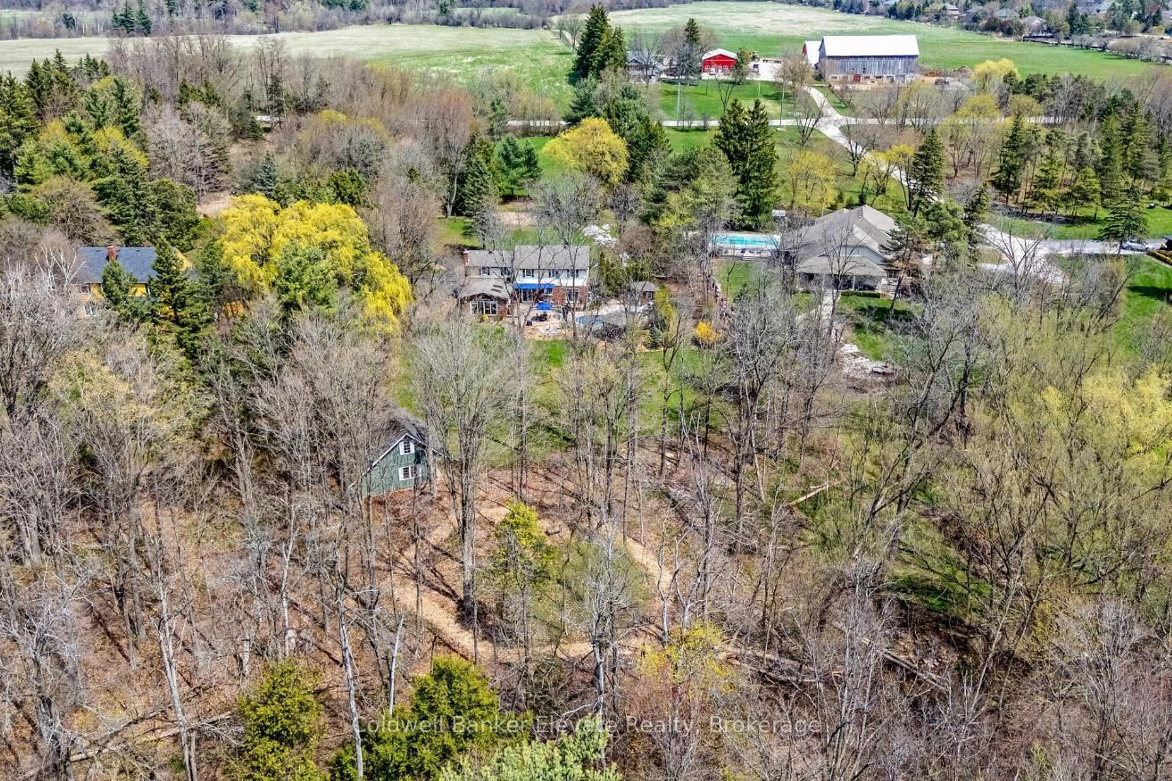 A pic from outside/outdoor area/front of a property/back of a property/a pic from drone, forest/trees view for 12282 Eighth Line, Halton Hills Ontario L7G 4S4